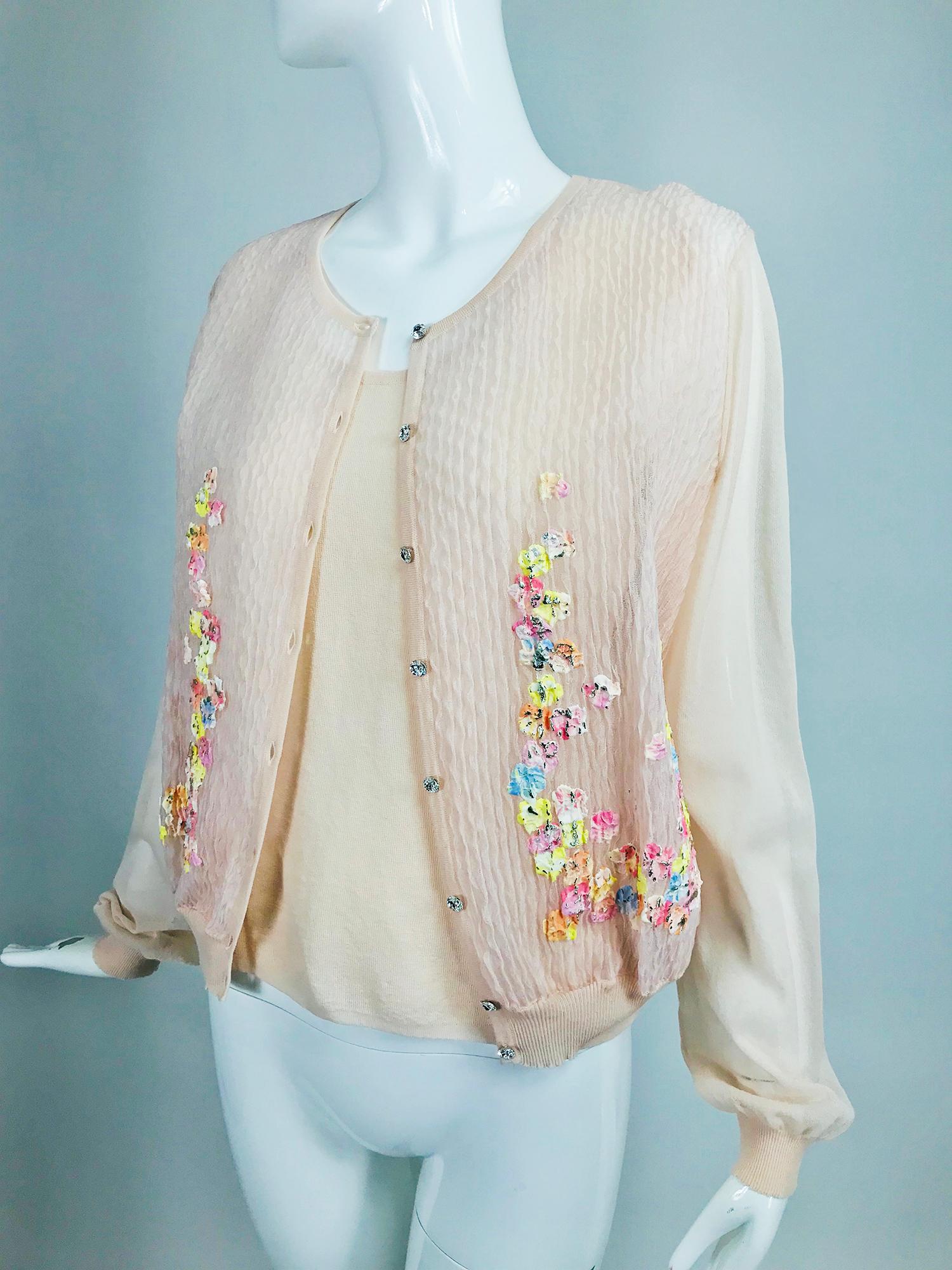 Escada blush sweater twin set floral Swarovski crystal buttons NWT XL, with tags and unworn, $1,195.00 USD. sweater, $550.00 USD shell. 
    Long sleeve sweater has sheer sleeves with ribbed cuffs, sweater back matches the cuffs, the front of the