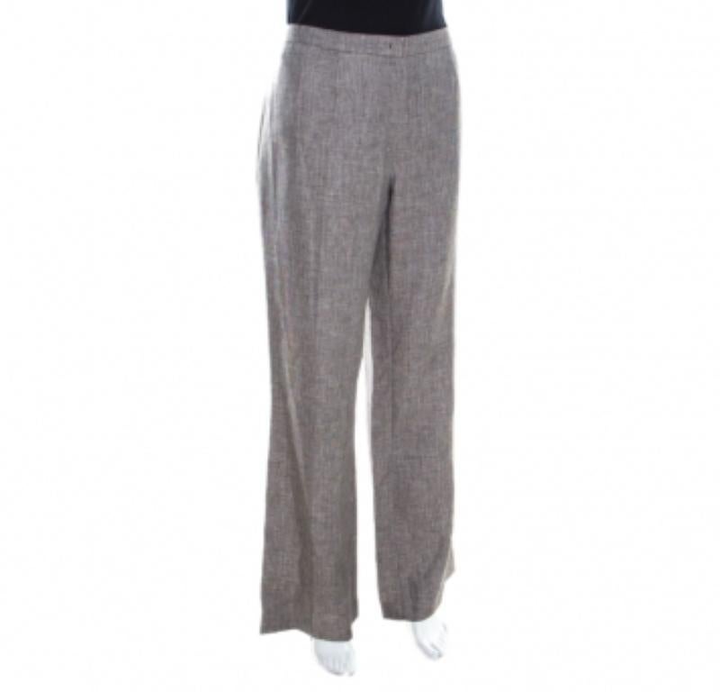 Cette création d'Escada se décline dans une subtile nuance de marron et présente une jambe large. Confectionné dans une combinaison de tissus fins, ce pantalon Hose confortable est doté d'une fermeture à glissière. Cette paire élégante sera parfaite