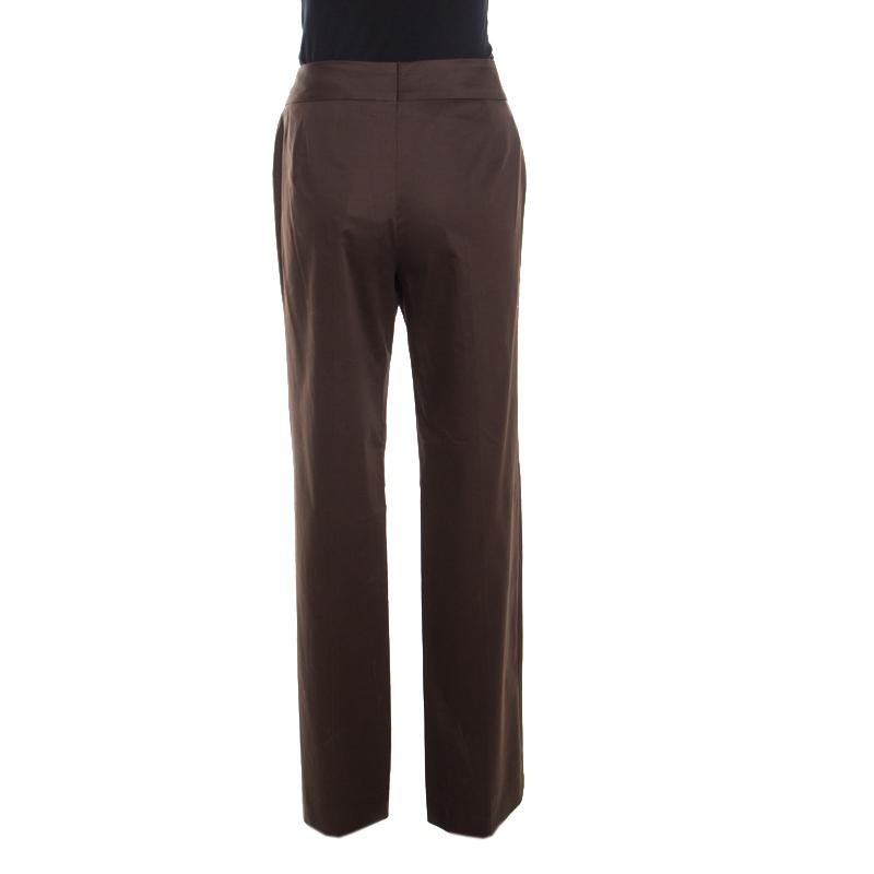 These brown trousers from Escada are perfect to enhance your style. These are made of a cotton blend and are designed in a straight leg silhouette. They flaunt a polished finish and you can pair them easily with any colored top and wedge