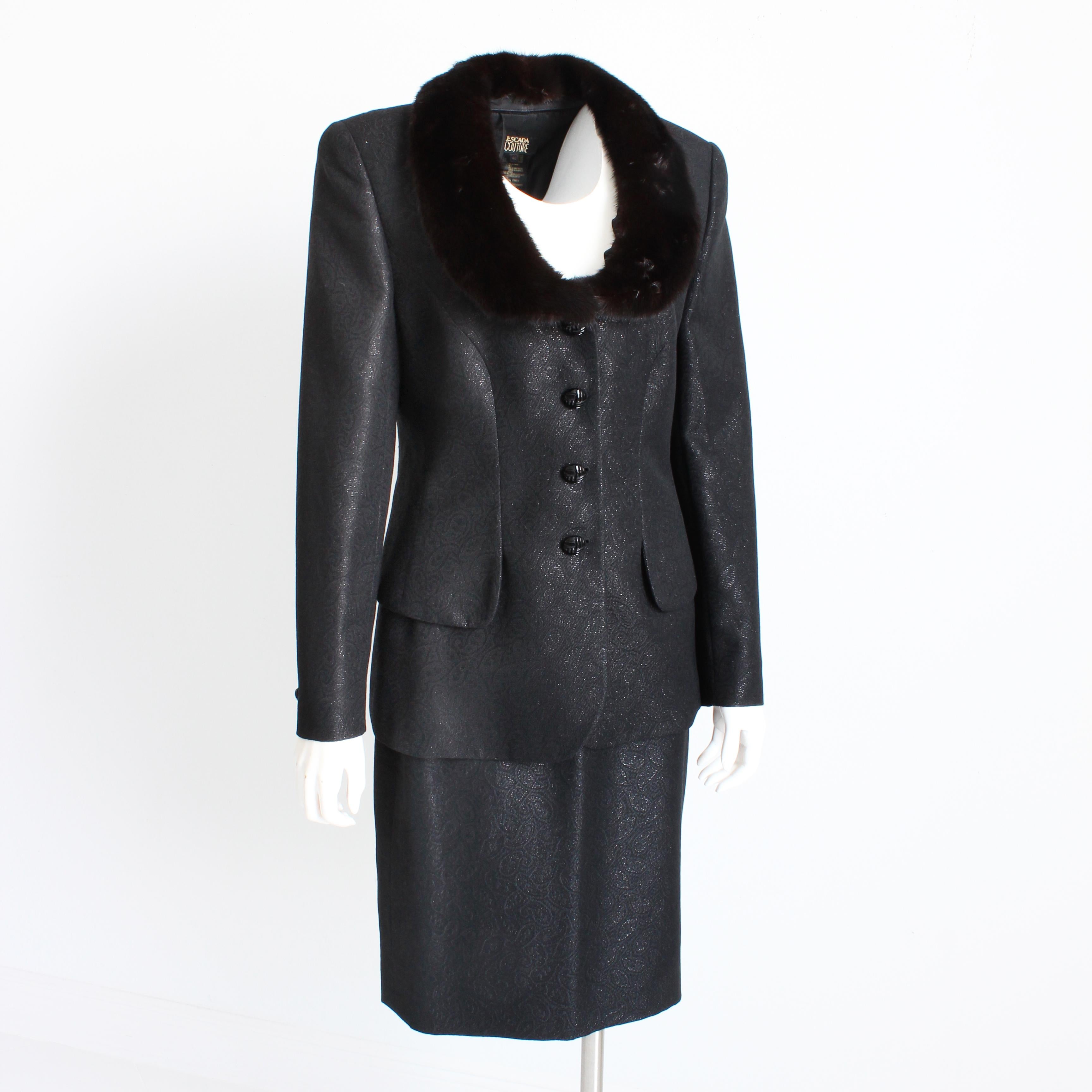 Escada Couture jacket and skirt suit, likely made in the early 2000s.  Made from an incredible paisley print fabric with metallic lurex thread, which gives this set a lovely sheen especially under light!  

Sophisticated, chic and quality-made, as