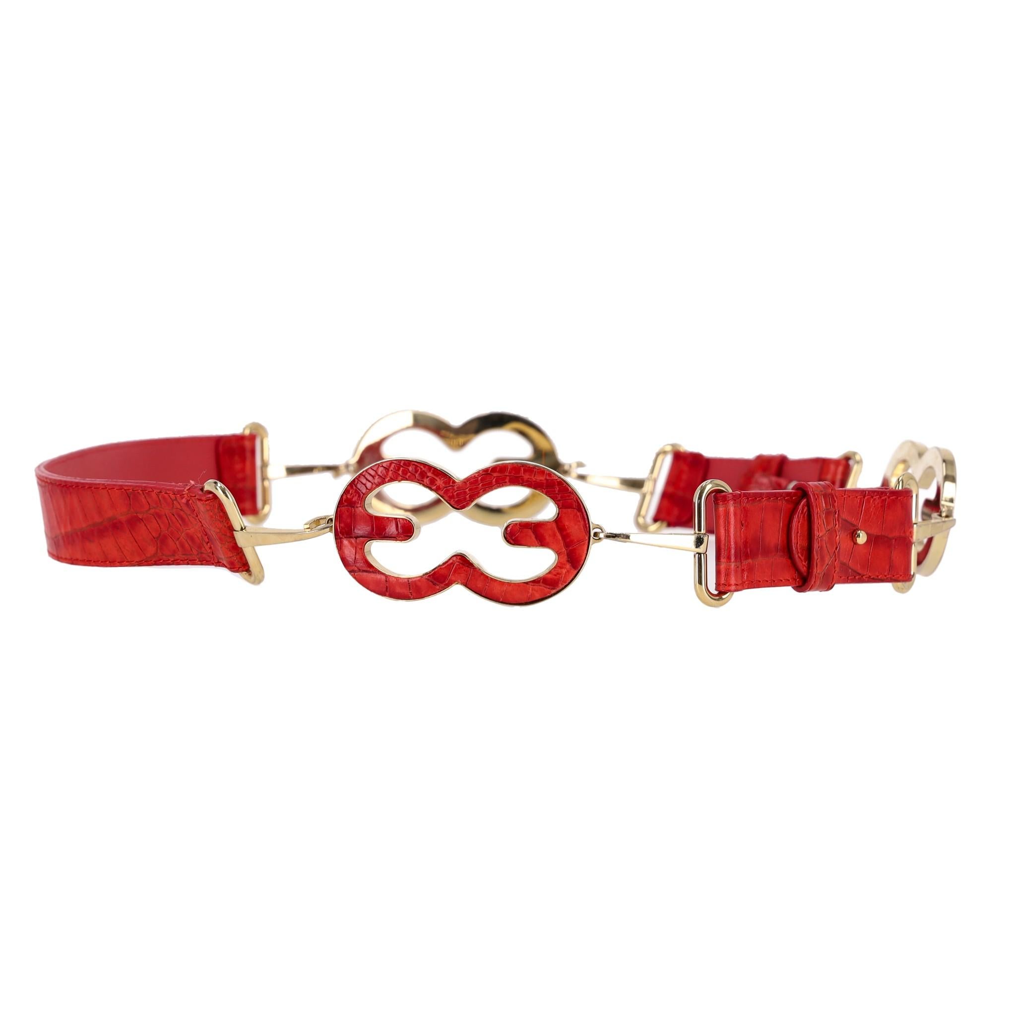 Escada Croc Embossed Leather Triple-Buckle Belt

Crocodile embossed red leather with silver hardware.

Detailed with three Escada logo-shaped buckles each having dual hook closures.

Rrp Approx. £300

Size – L - Length 88cm, Width 3cm

Condition –