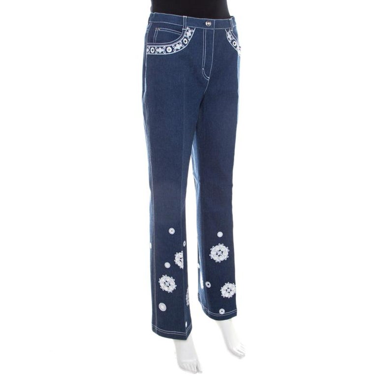https://a.1stdibscdn.com/escada-dark-blue-cotton-stretch-denim-embroidered-floral-motif-flared-jeans-m-for-sale-picture-3/v_13101/1618049206837/luxury_women_escada_used_clothes_p207942_002_master.jpg?width=768