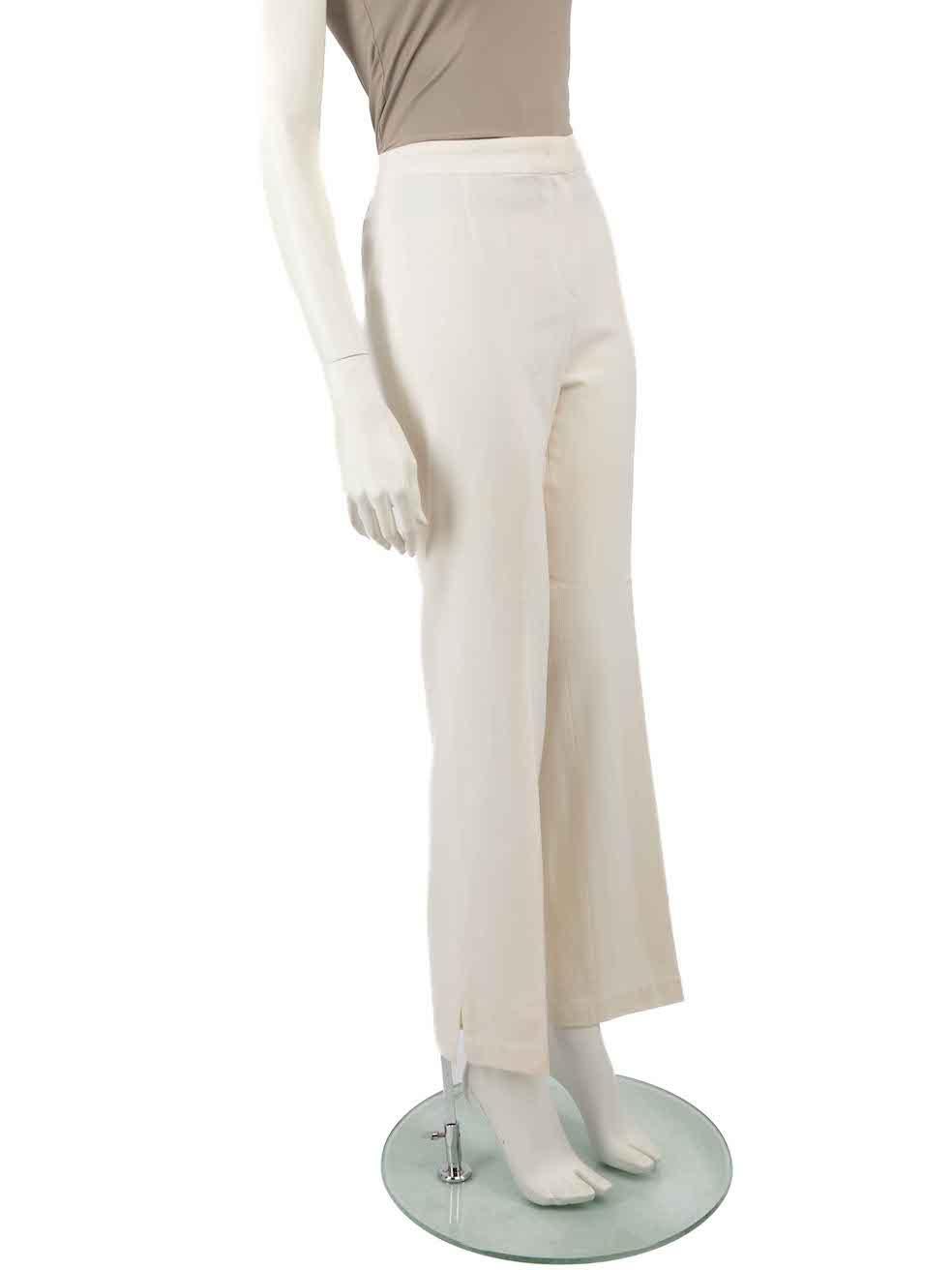 CONDITION is Good. Minor wear to trousers is evident. Light wear to the right leg with marks and the cuff split had been hand-sewn on this used Escada designer resale item.
 
 
 
 Details
 
 
 Ecru
 
 Wool
 
 Trousers
 
 Straight leg
 
 Mid rise
 
