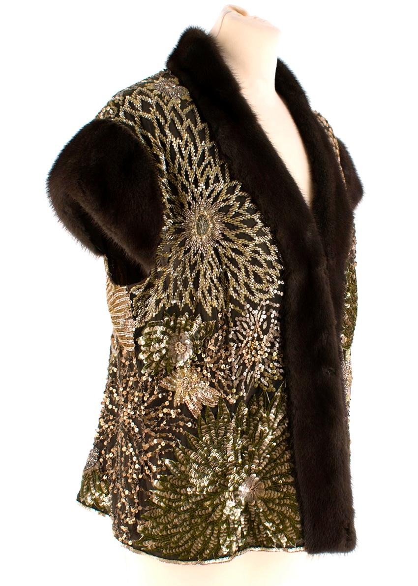 Escada Embellished Mink Vintage Short Sleeve Jacket

- Bead and sequin embroidered
- Floral design 
- Mink trims
- Sleeveless

100% Nylon, 100% Silk, 100% Mink.
Measurements are taken laying flat, seam to seam. 
Shoulder to Shoulder: 48cm
Pit to
