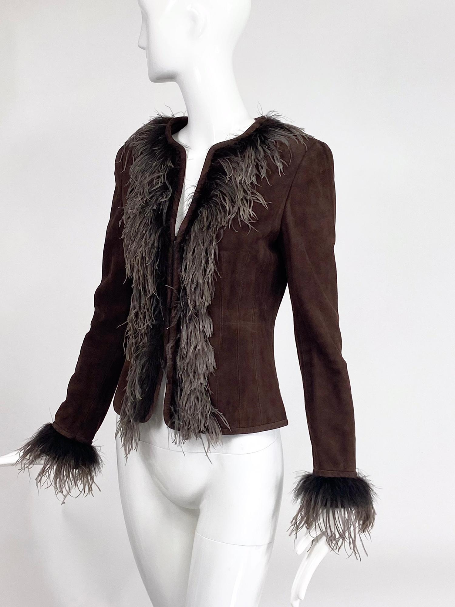 Escada ostrich feather trimmed, chocolate brown goat suede jacket. Princess seamed jacket is trimmed in dark and light ostrich feathers at the cuffs, collar and fronts. The jacket closes at the front with hidden bar hooks. Fully lined in Escada logo