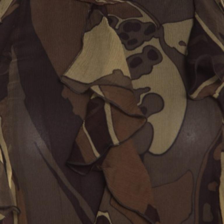 Grace mixed with fashion, you cannot go wrong with this Escada dress. Offering both comfort and style, this maxi dress brings fauna prints, ruffles and a halter neckline. You can pair it with high heel sandals and a small clutch.