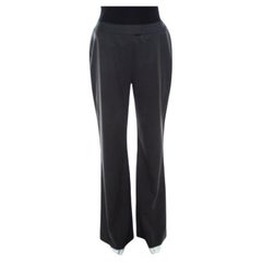 Escada, pantaloni a vita alta e gamba larga in lana elasticizzata di colore grigio M. I.