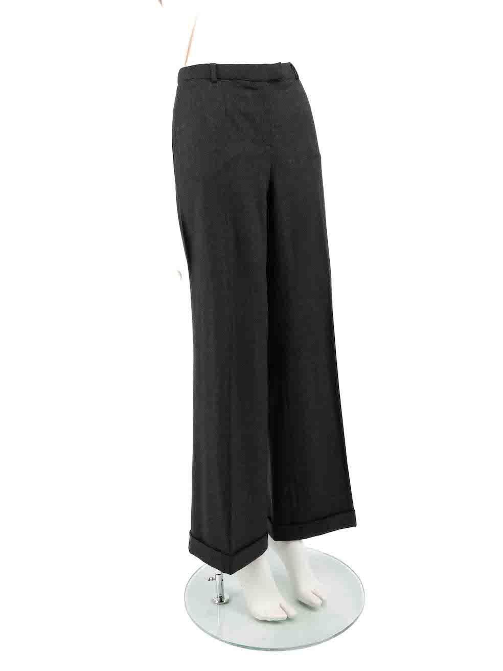 CONDITION is Very good. Hardly any visible wear to trousers is evident on this used Escada designer resale item.
 
 
 
 Details
 
 
 Grey
 
 Wool
 
 Wide leg trousers
 
 Mid rise
 
 Front zip closure with clasp and button
 
 Belt hoops
 
 2x Front