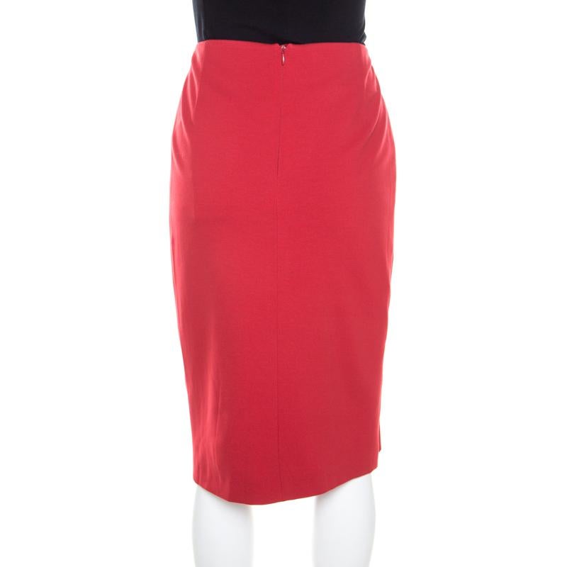 This red Escada stretch skirt has a well-tailored shape and a simple design that entails a drape. Made to fit you splendidly, this elegant piece can be paired with any top of your choice and some statement pumps.

Includes: The Luxury Closet