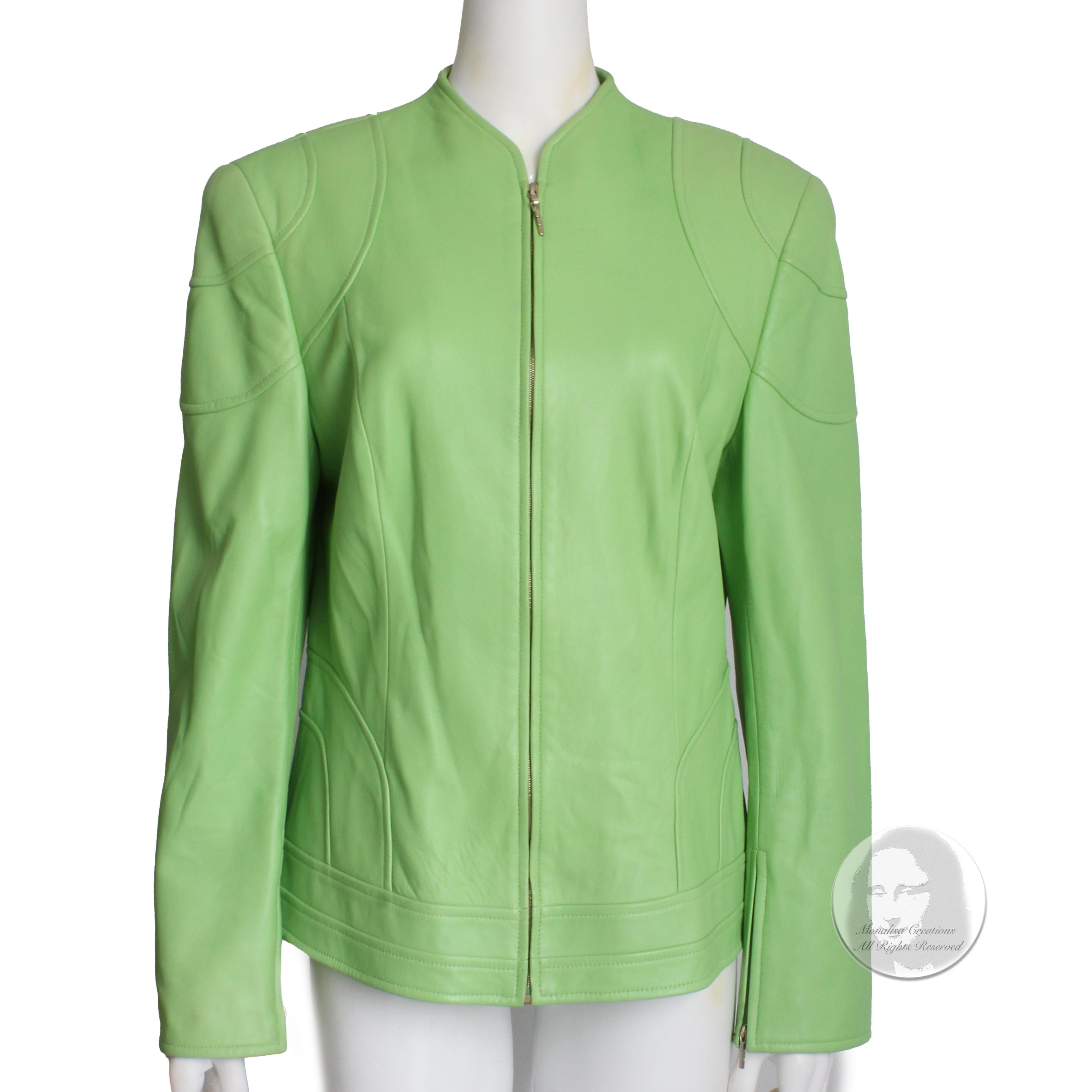 Authentic, preowned leather jacket with zipper front, likely made in the late 90s. Made from vibrant lime green lambskin leather, this jacket is butter-soft and gorgeous! Zipper fastener with smaller zippers at each sleeve bottom.  

Perfect for