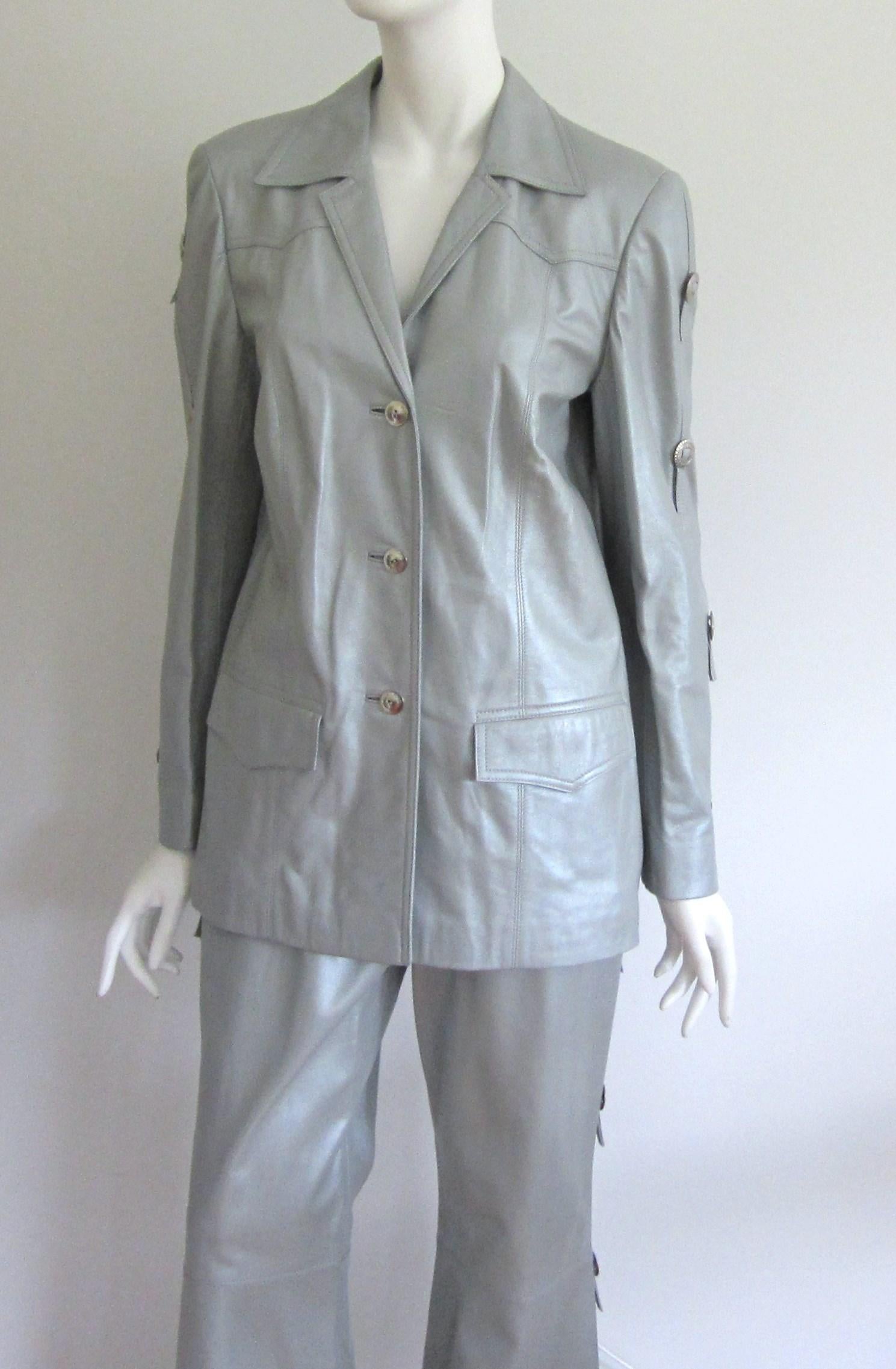 Escada Leather Western Motif Grey Suit Jacket Wide Bell Bottom Pants New With Tags 1990s. WIll fit an 8-10. Please refer to measurements. Both the jacket  and pants are marked a size 38 - Measuring up to 38 inch bust. -- up to 36 inch waist -- 29.25