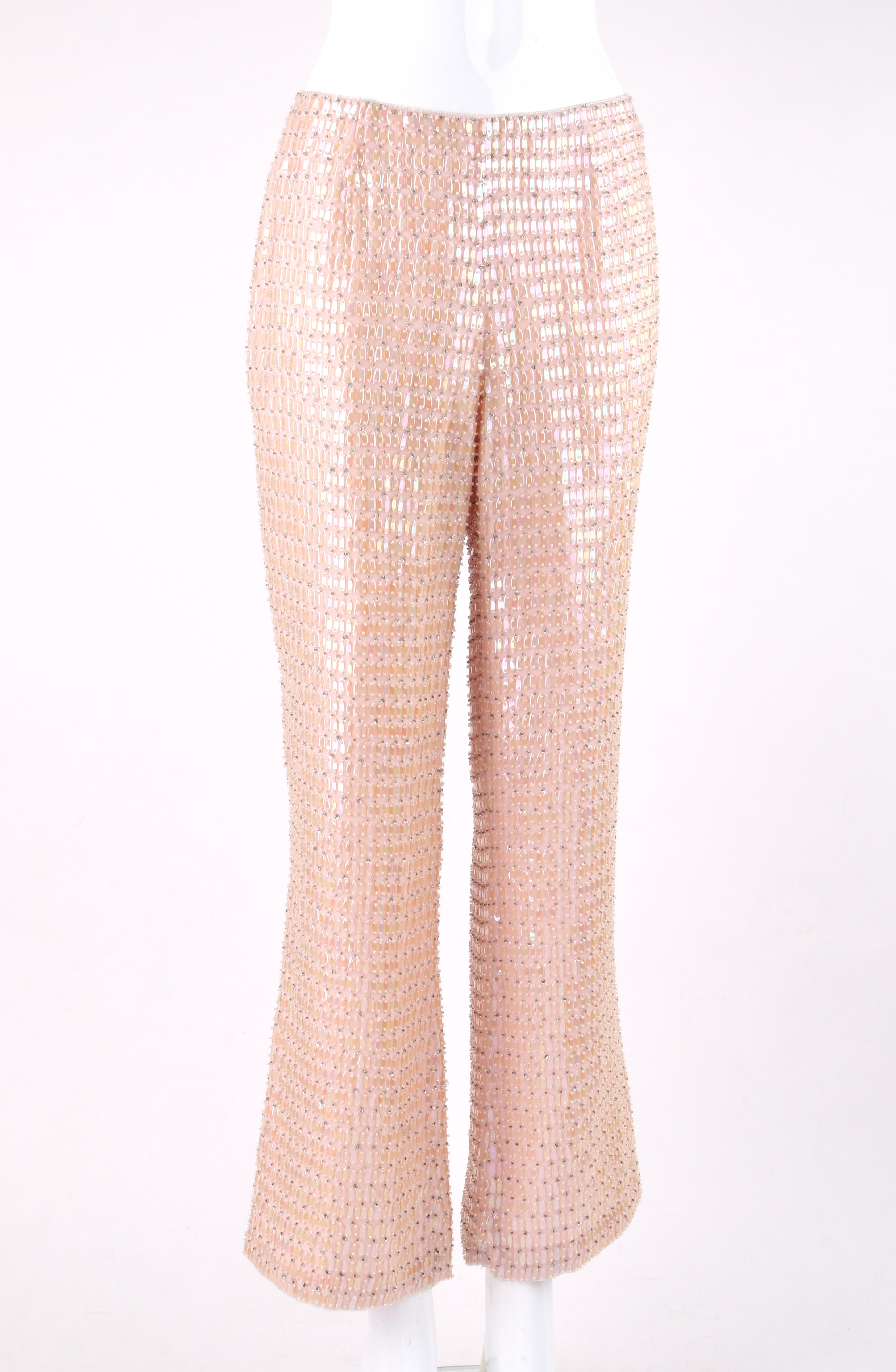 ESCADA Light Pink Silk Bead & Sequin Embellished Shimmer Wide Leg Flare Pants

Brand / Manufacturer: Escada
Style: Fully beaded straight wide leg flat front slack pant
Color(s): Shades of pink and silver
Lined: Yes
Marked Fabric Content: 100%