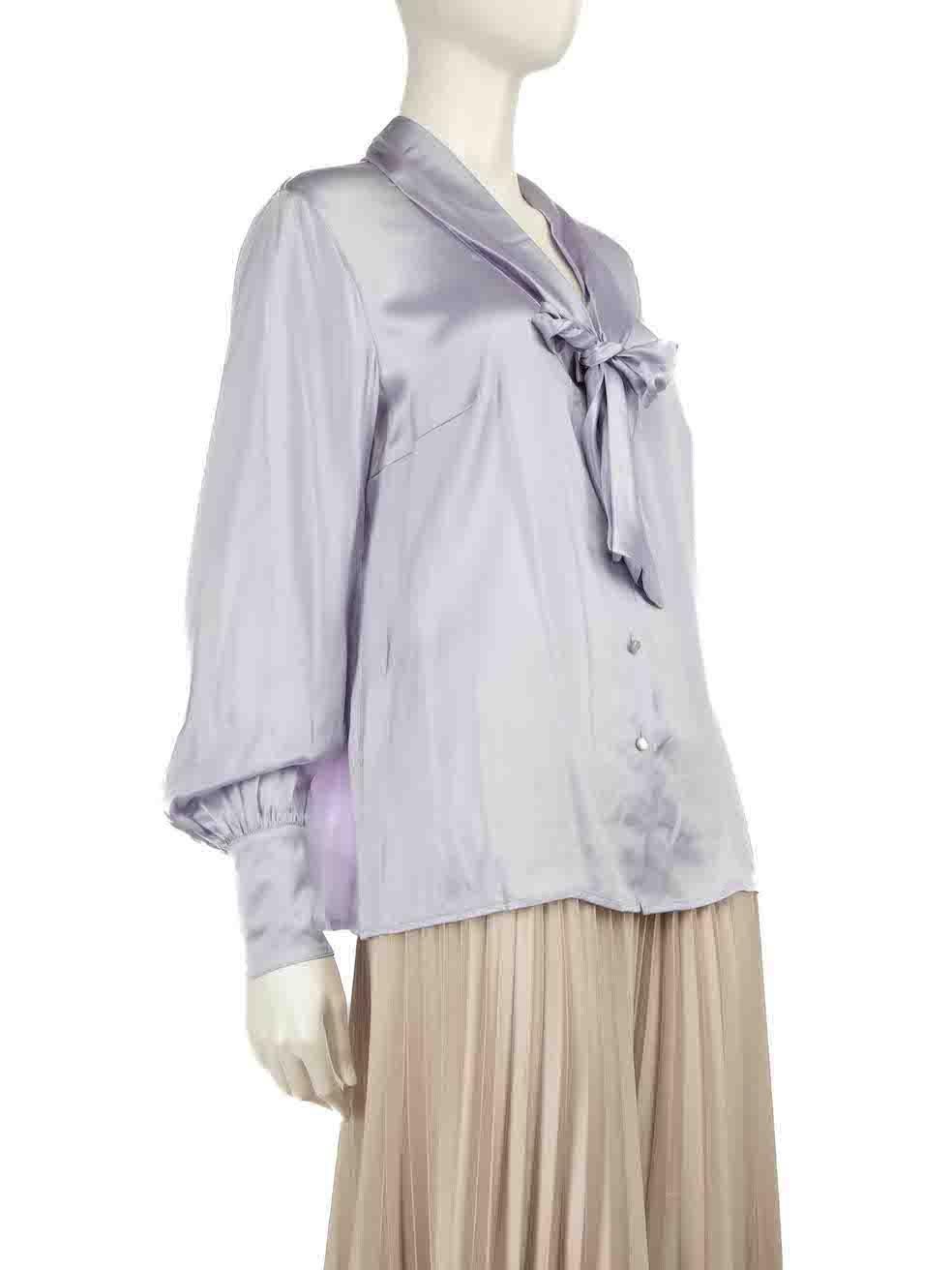 CONDITION is Never worn, with tags. No visible wear to the blouse is evident on this new Escada designer resale item.
 
 
 
 Details
 
 
 Lilac
 
 Silk
 
 Blouse
 
 Long sleeves
 
 Buttoned cuffs
 
 V-neck
 
 Neck tie detail
 
 Button up fastening
