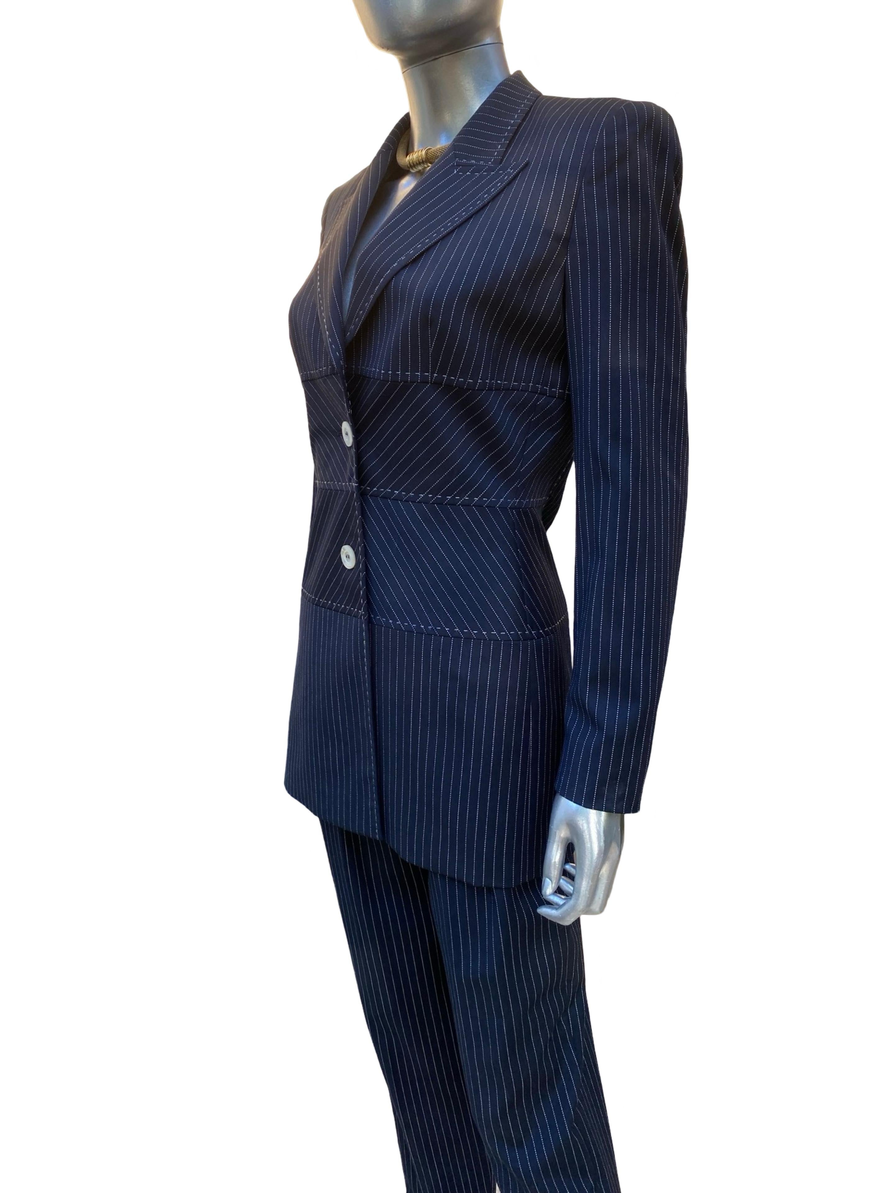 This 3 piece ensemble designed by Margaretha Ley for Escada is the most beautifully made suit we have ever seen other than Couture suits from Paris. The fabric is an exclusive 