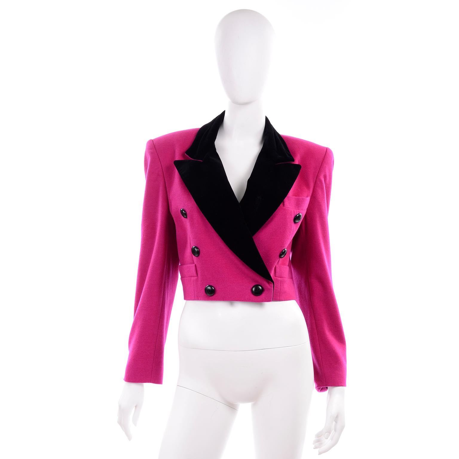 This is a great vintage cropped blazer designed by Margaretha Ley for Escada in the 1980's.  This bright pink silk/wool blend double breasted jacket has black velvet lapels, black buttons on the cuffs of sleeves and on the front. and 3 front