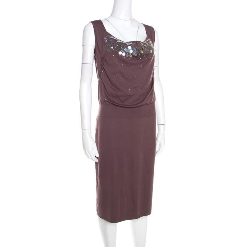 Look effortlessly stylish in this fabulous Escada dress. Be at your glamorous best when you wear this gorgeous brown dress to a party or event alike. Masterfully tailored in a blend of silk and cotton, this dress is an impeccable balance between