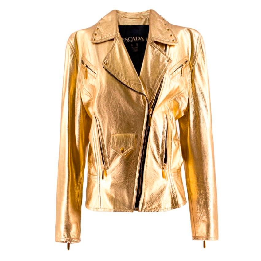 Escada Metallic Gold Leather Biker Jacket

- Metallic gold leather
- Biker style jacket
- Gold-tone studs embellish the collar and back of the jacket
- Four external zipped pockets and a press stud pocket
- Zipped cuffs and two rear zipped hem