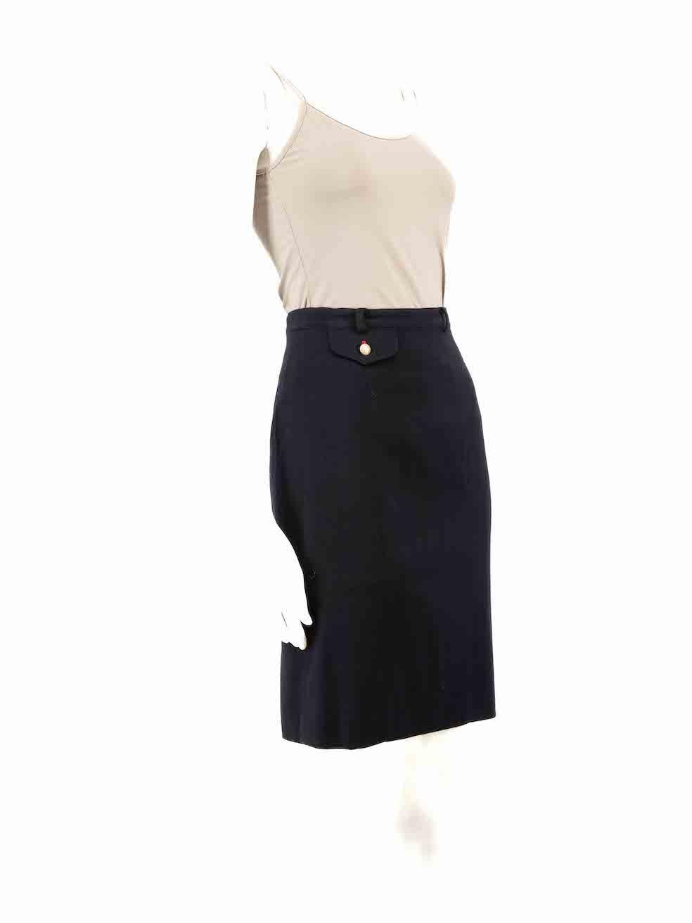 CONDITION is Very good. Hardly any visible wear to skirt is evident on this used Escada designer resale item.
 
 
 
 Details
 
 
 Navy
 
 Wool
 
 Skirt
 
 Knee length
 
 Side zip and button fastening
 
 Front pocket flap detail
 
 
 
 
 
 Made in