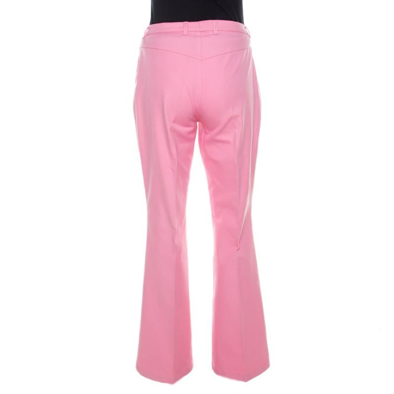 Every wardrobe deserves a fabulous pair of denims and what better than these jeans from Escada. The pink pair is made of a cotton blend and features a feminine appeal. Flared bottoms and multiple pockets all make these jeans a must buy.

Includes: