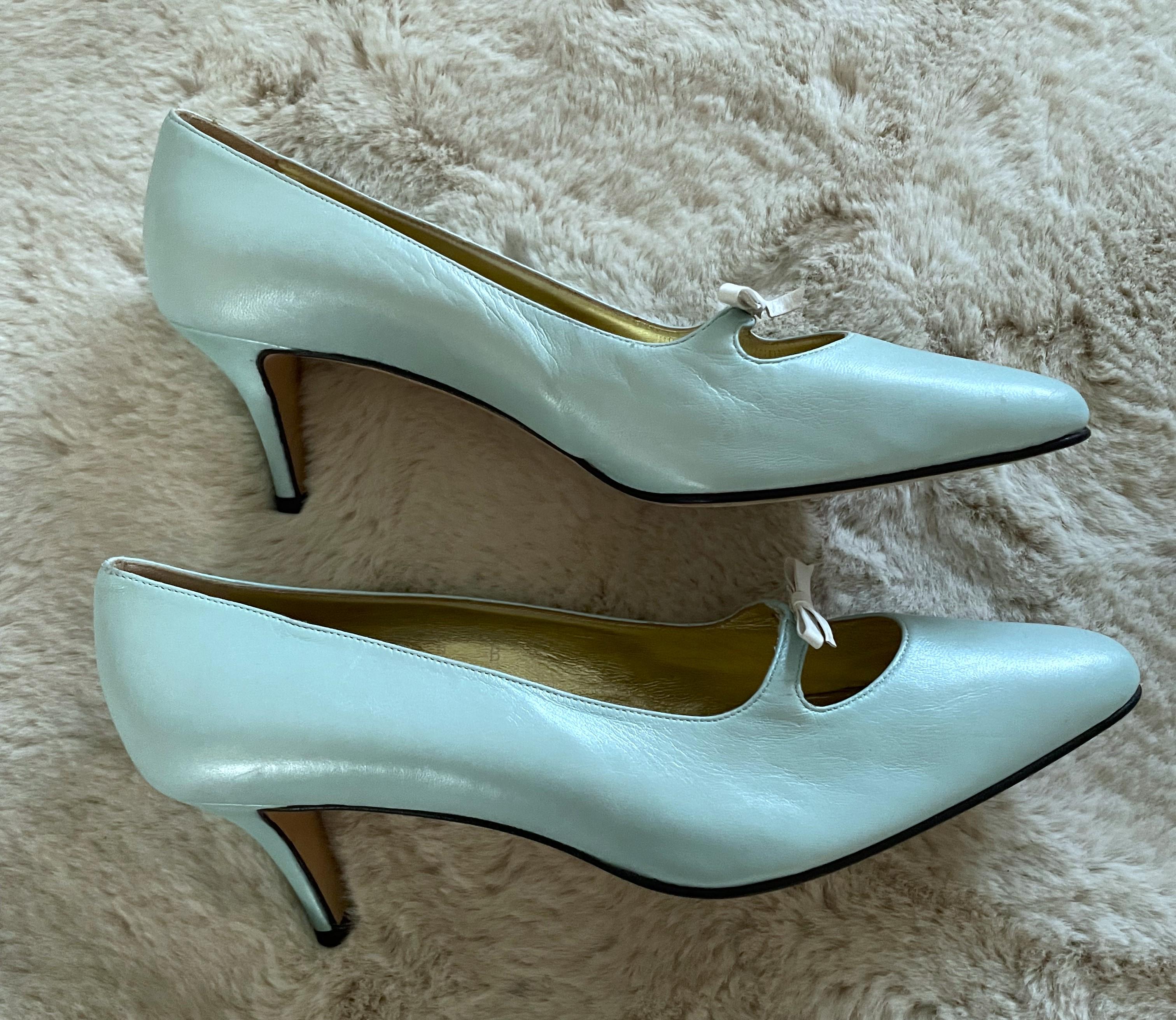 These cute vintage hard to find Escada baby blue pumps are typically a type of women's shoe from  the 1990s.  The color soft and pastel shade of light metallic blue, was popular in the 90s fashion scene.

Escada is a luxury fashion brand known for
