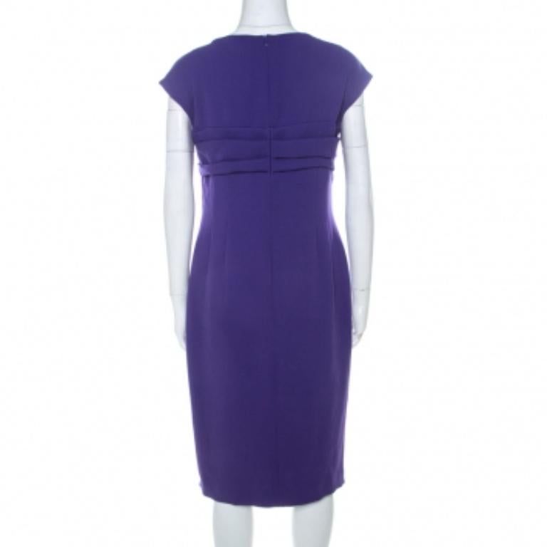 An Escada dress like this purple one is a splendid piece that will lend an edge to your collection. Characterised by a smart sleeveless silhouette with a pleated bodice, this Danicara dress will make you look fabulous each time you flaunt it.