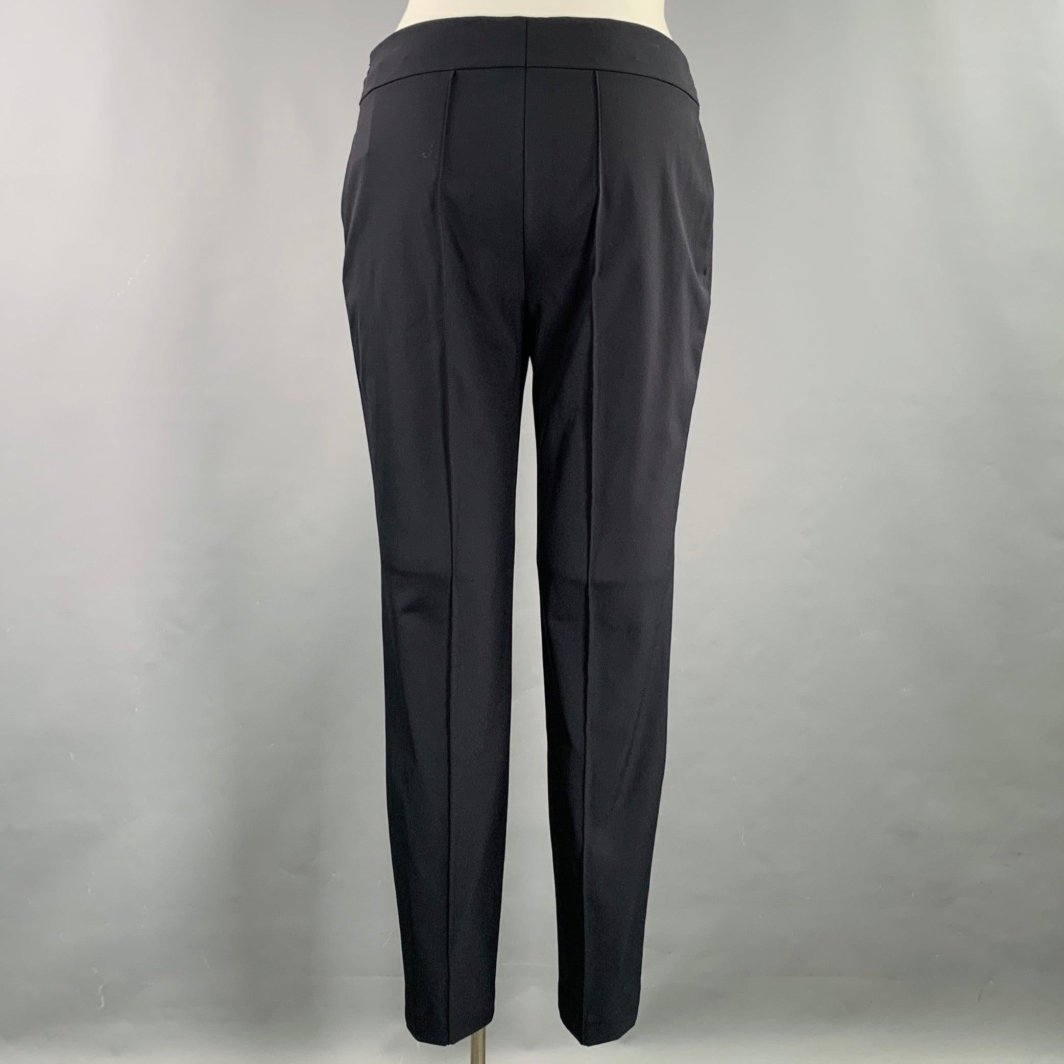 ESCADA dress pants
in a navy polyamide blend fabric featuring a straight leg and side zipper closure. Made in Romania.Excellent Pre-Owned Condition. 

Marked:   IT 42 

Measurements: 
  Waist: 37 inches Rise: 11 inches Inseam: 29 inches 
  
  
 
Sui