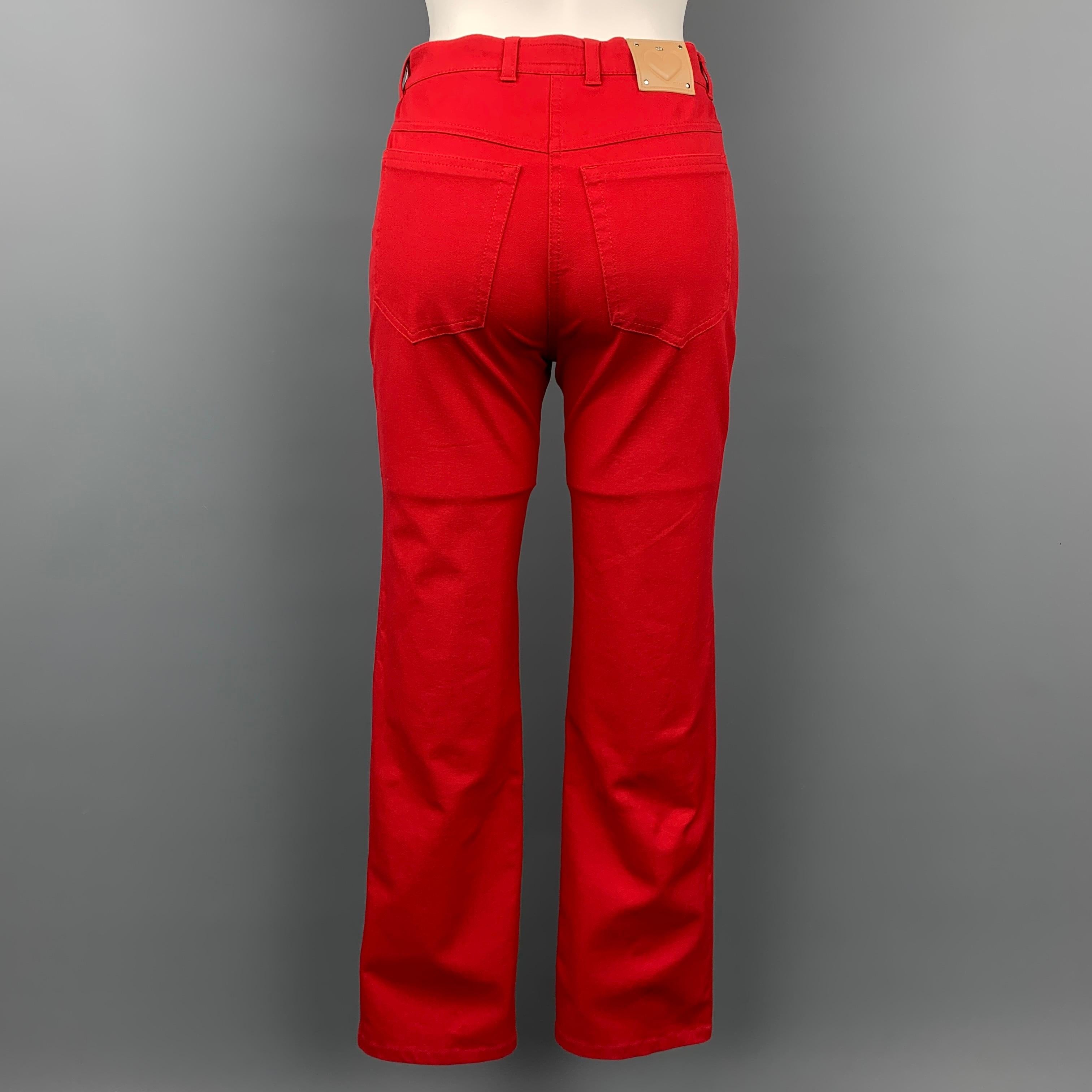 ESCADA dress pants comes in a red stretch cotton featuring a straight leg, silver tone hardware, and a zip fly closure. 

Very Good Pre-Owned Condition.
Marked: 34

Measurements:

Waist: 26 in.
Rise: 10 in.
Inseam: 30 in. 
