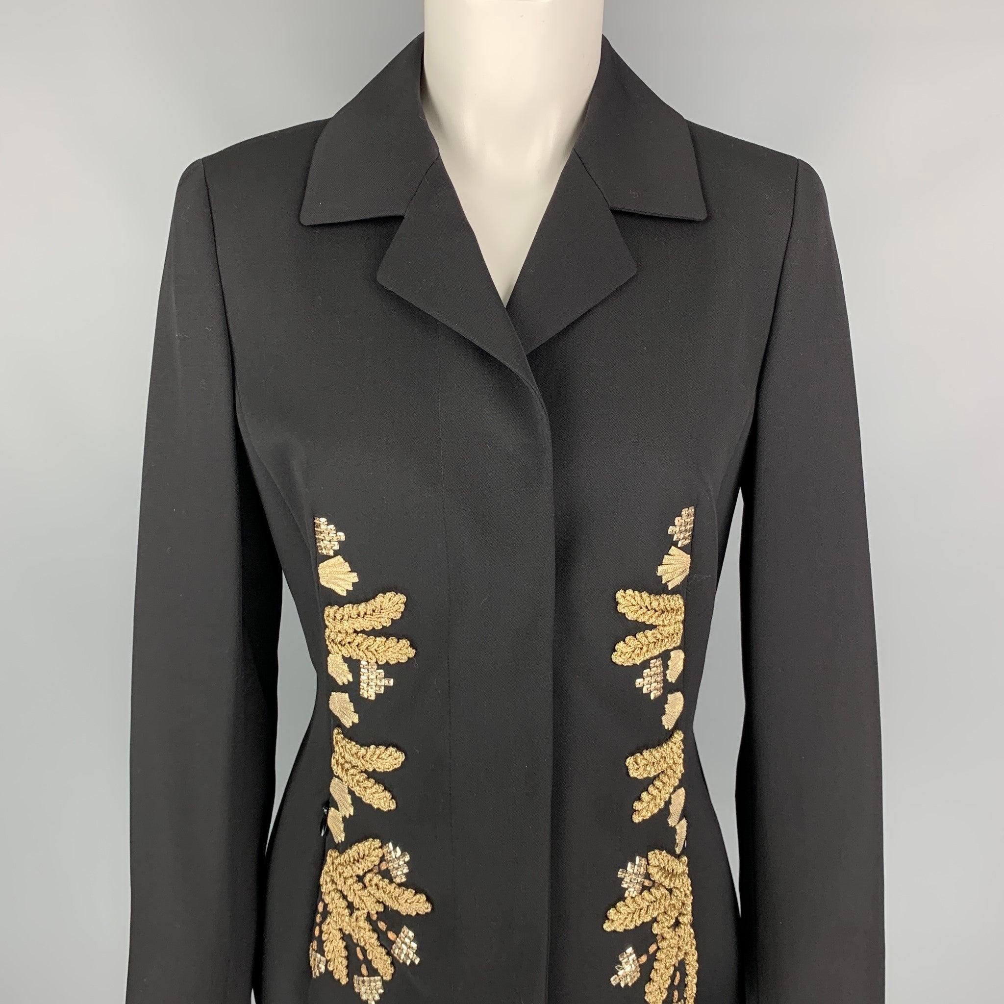 ESCADA jacket comes in a black virgin wool with a full liner featuring a notch lapel, gold tone embellishment details, zipper pockets, and a hidden snap button closure.
New With Tags.
 

Marked:   36 

Measurements: 
 
Shoulder: 15.5 inches  Bust:
