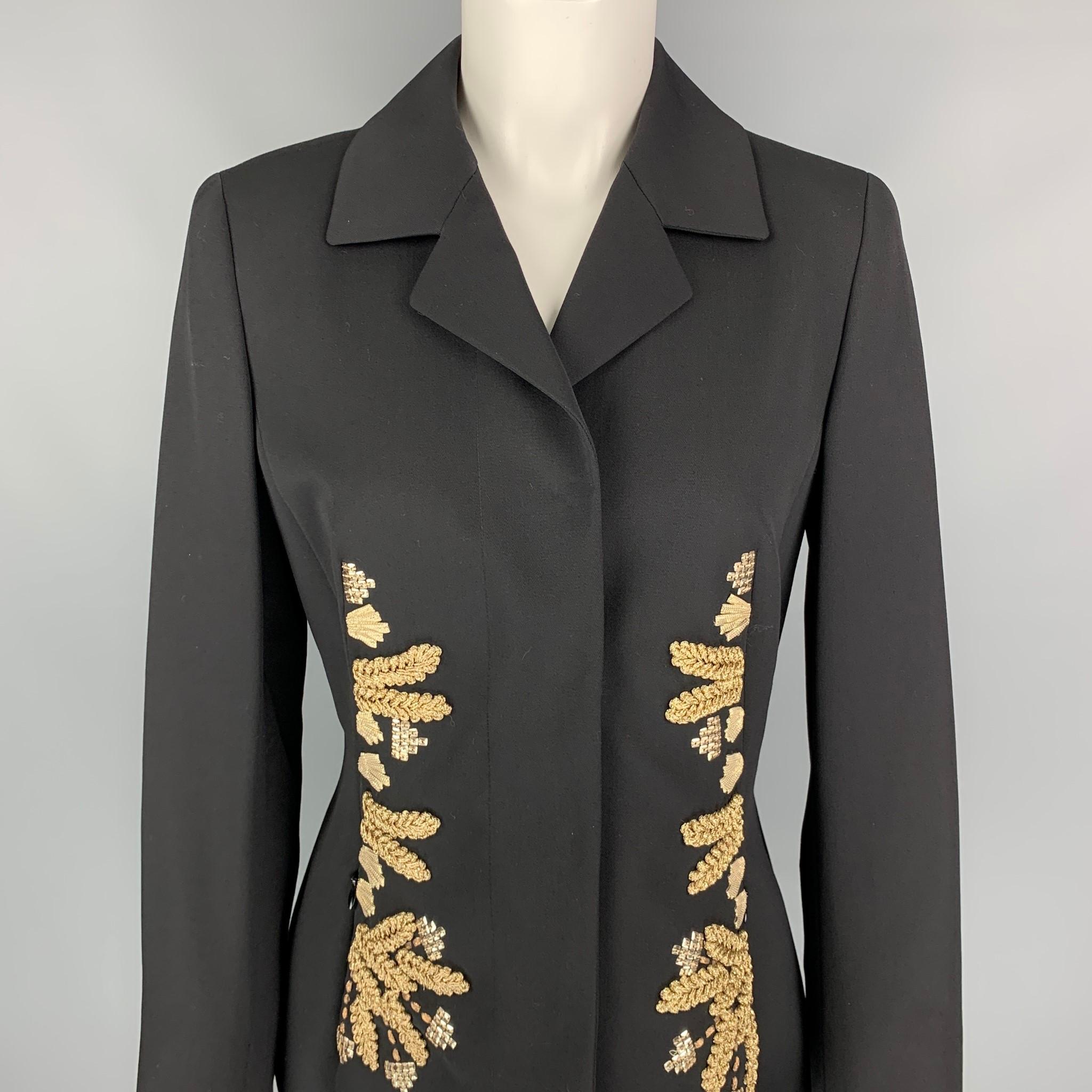 ESCADA jacket comes in a black virgin wool with a full liner featuring a notch lapel, gold tone embellishment details, zipper pockets, and a hidden snap button closure. 

New With Tags. 
Marked: 36

Measurements:

Shoulder: 15.5 in.
Bust: 34