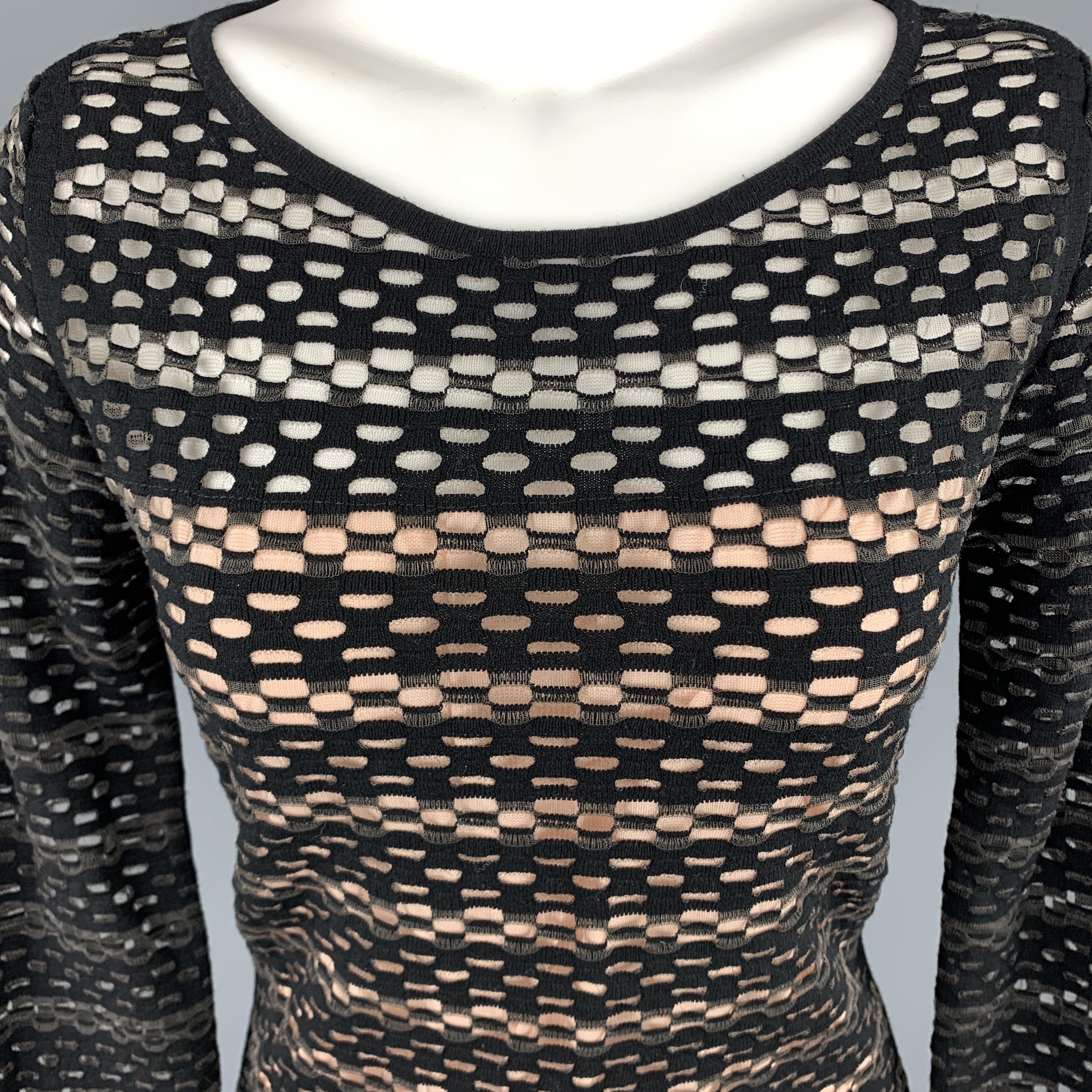 ESCADA top comes in see through stretch mesh with a black and grey opaque stripes, scoop neck, cropped sleeves, and beige liner.  Made in Italy.

Excellent Pre-Owned Condition.
Marked: S

Measurements:

Shoulder: 14 in.
Bust: 34 in.
Sleeve: 20