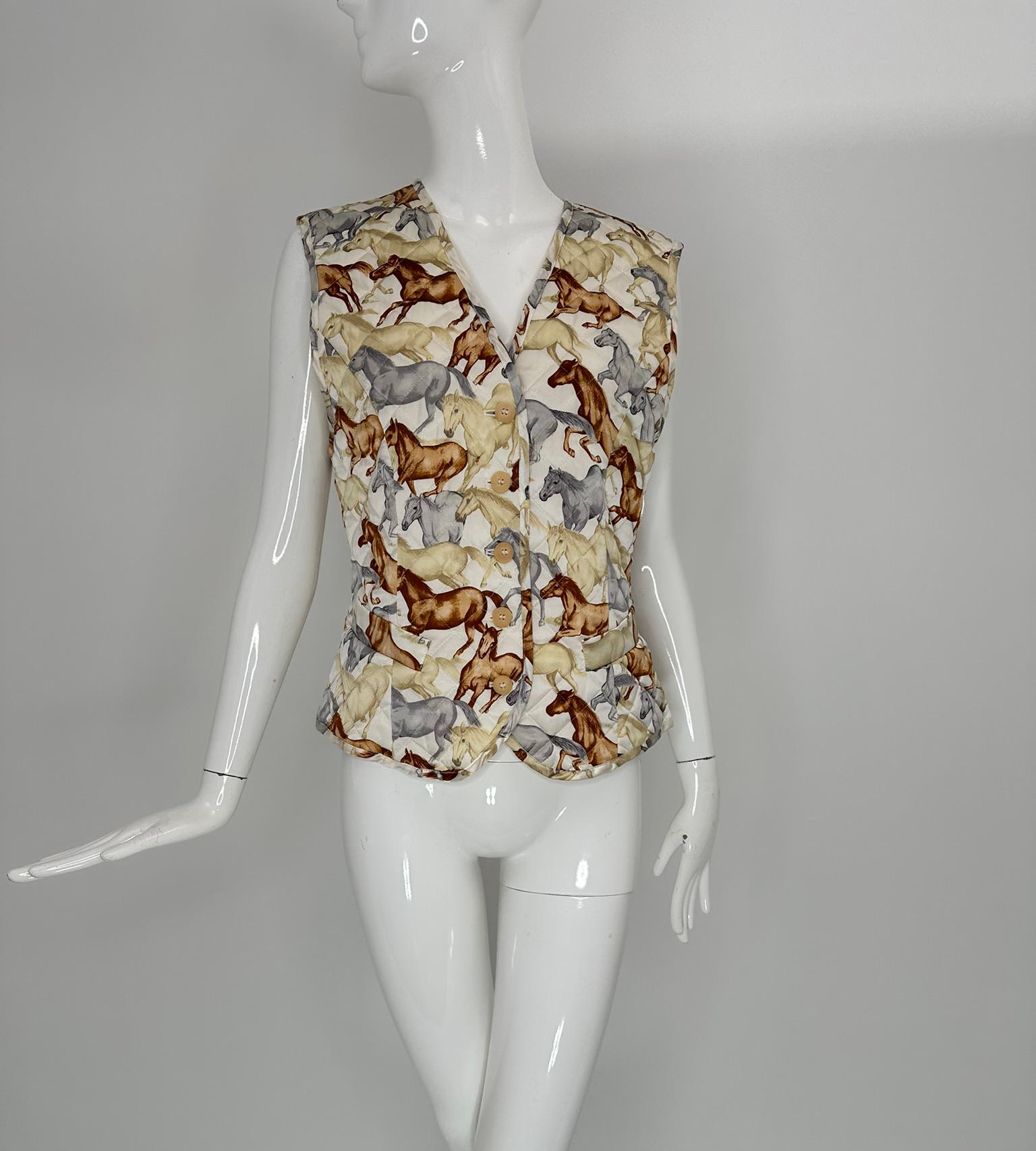 Escada vintage 1980s wild horses quilted silk print vest marked size 38. Wild horses run across this beautiful vest, it closes at the front with beige buttons, there are two hip front faux pockets. The vest is lined in cream silk. A desirable