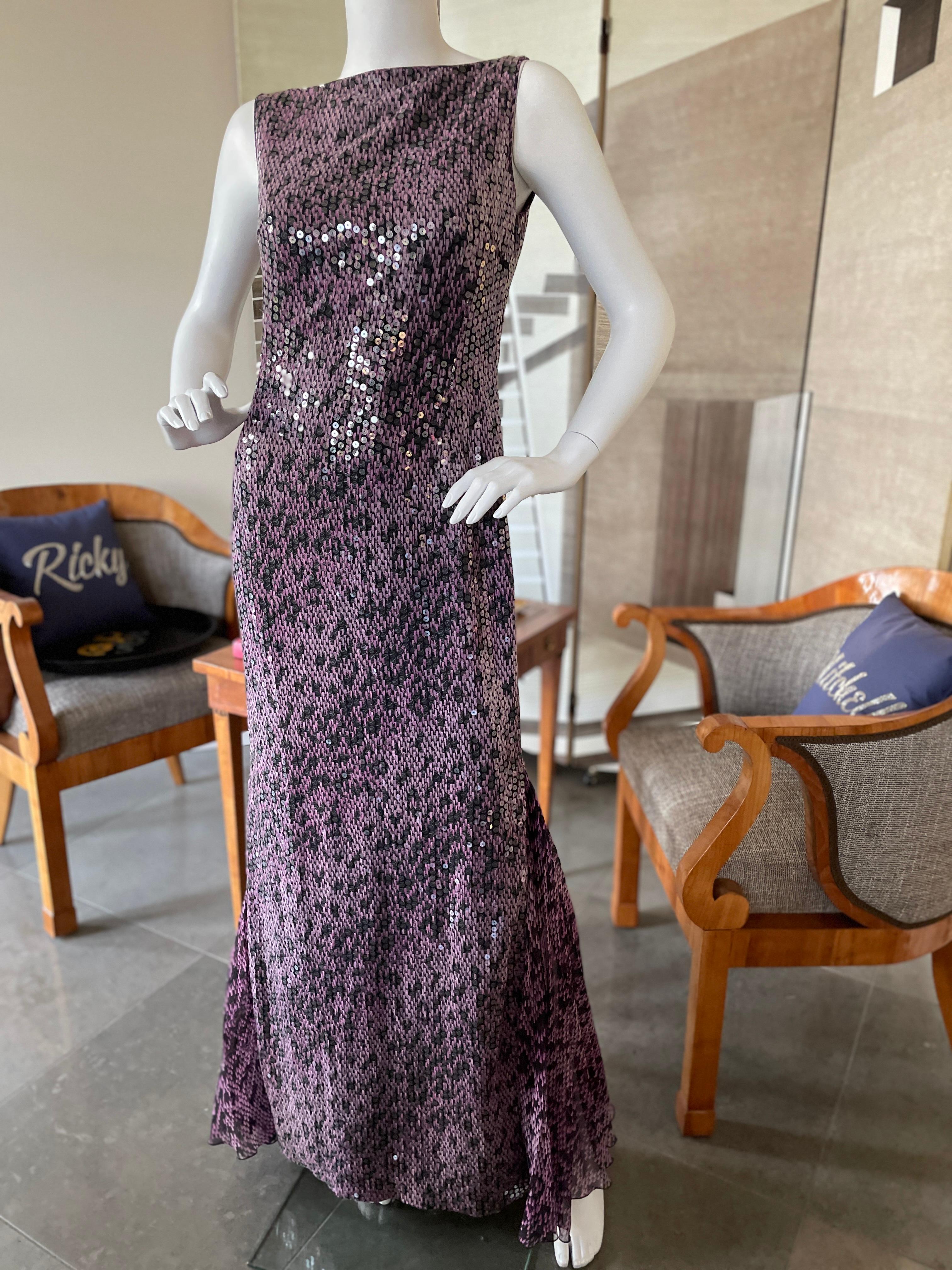 Escada Vintage Purple Sequin Leopard Print Evening Dress with Lace Up Back.
This is so pretty, I love it. It has pleated fishtail panels at the sides and as a train.
 Size 38 German
 Bust 34