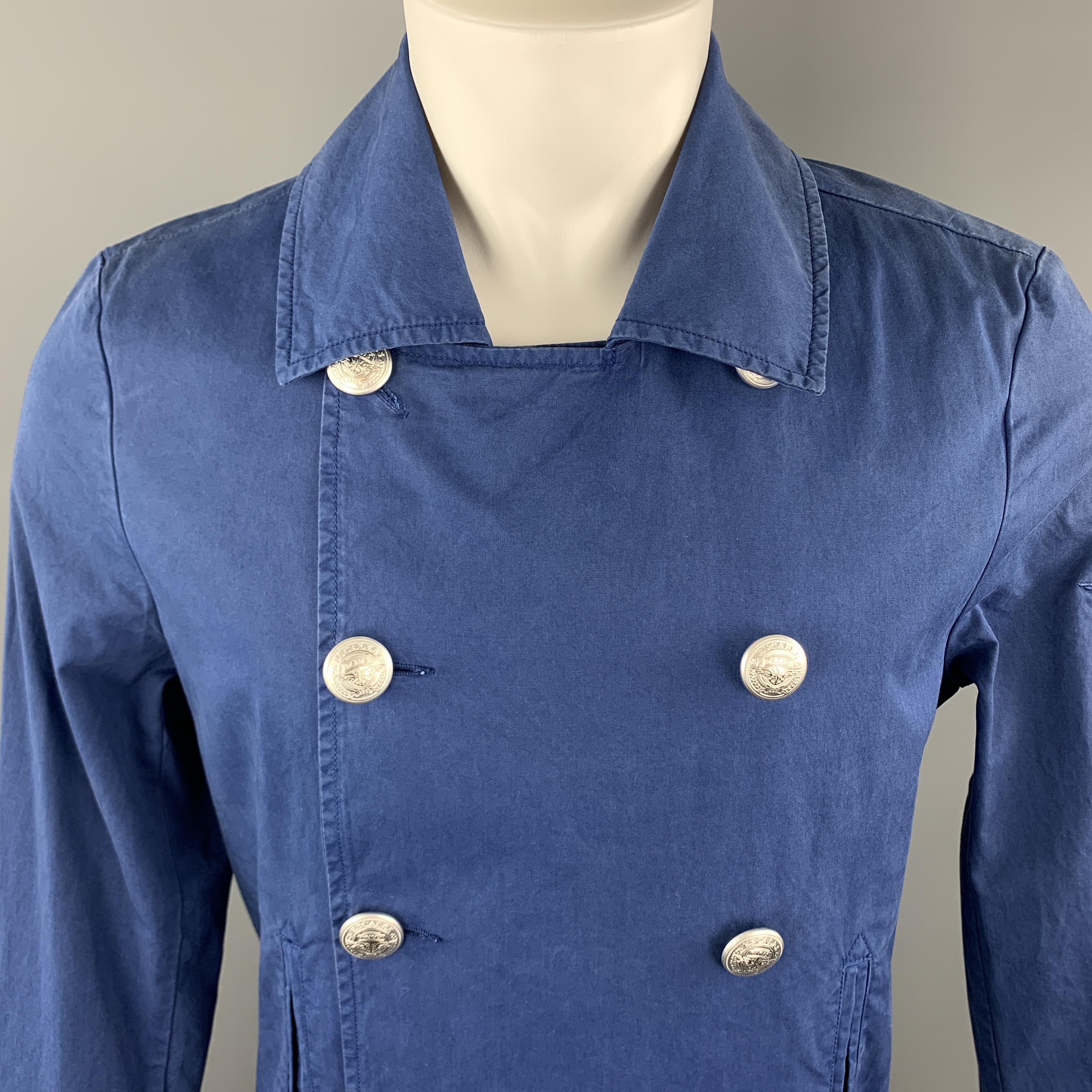 ESCALES Jacket comes in a blue washed cotton material, double breasted, with embossed silver tone metal buttons, slit pockets, trim and functional buttons at cuffs, unlined. 

New With Tags.
Marked: M

Measurements:

Shoulder: 17.5 in.
Chest: 42 in.
