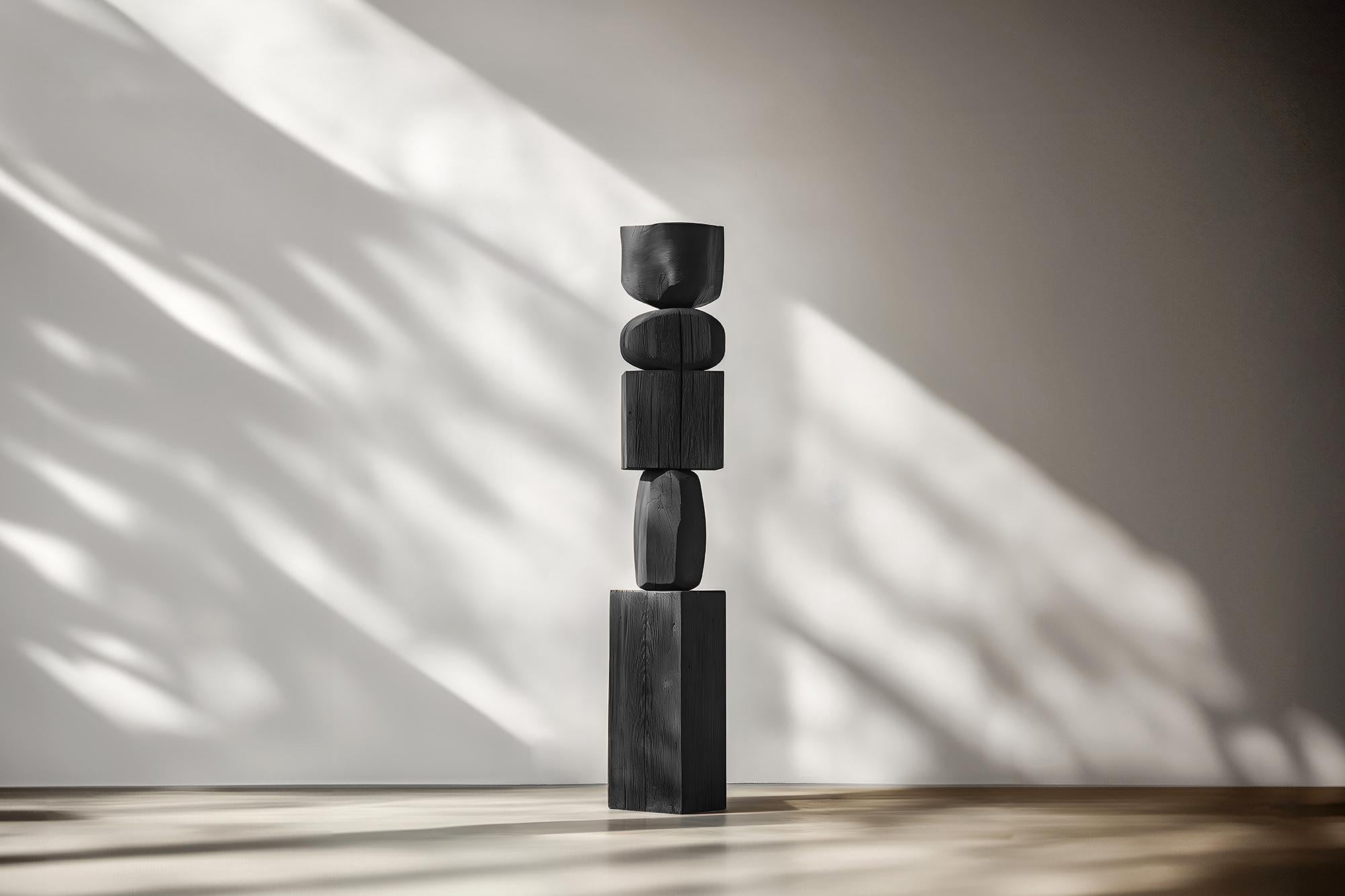 Escalona's Black Solid Wood Sculpture of Abstract Elegance, Still Stand No85
——

Joel Escalona's wooden standing sculptures are objects of raw beauty and serene grace. Each one is a testament to the power of the material, with smooth curves that