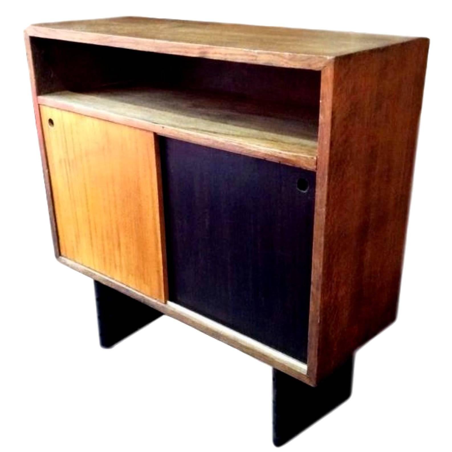 Super rare escande cabinet. Designed for University D' Antony. Escande was a student of Prouve. This design bares a striking resemblance to some of Prouve's best pieces. Hardly ever available for sale. Oak frame with sliding doors and inset cubby