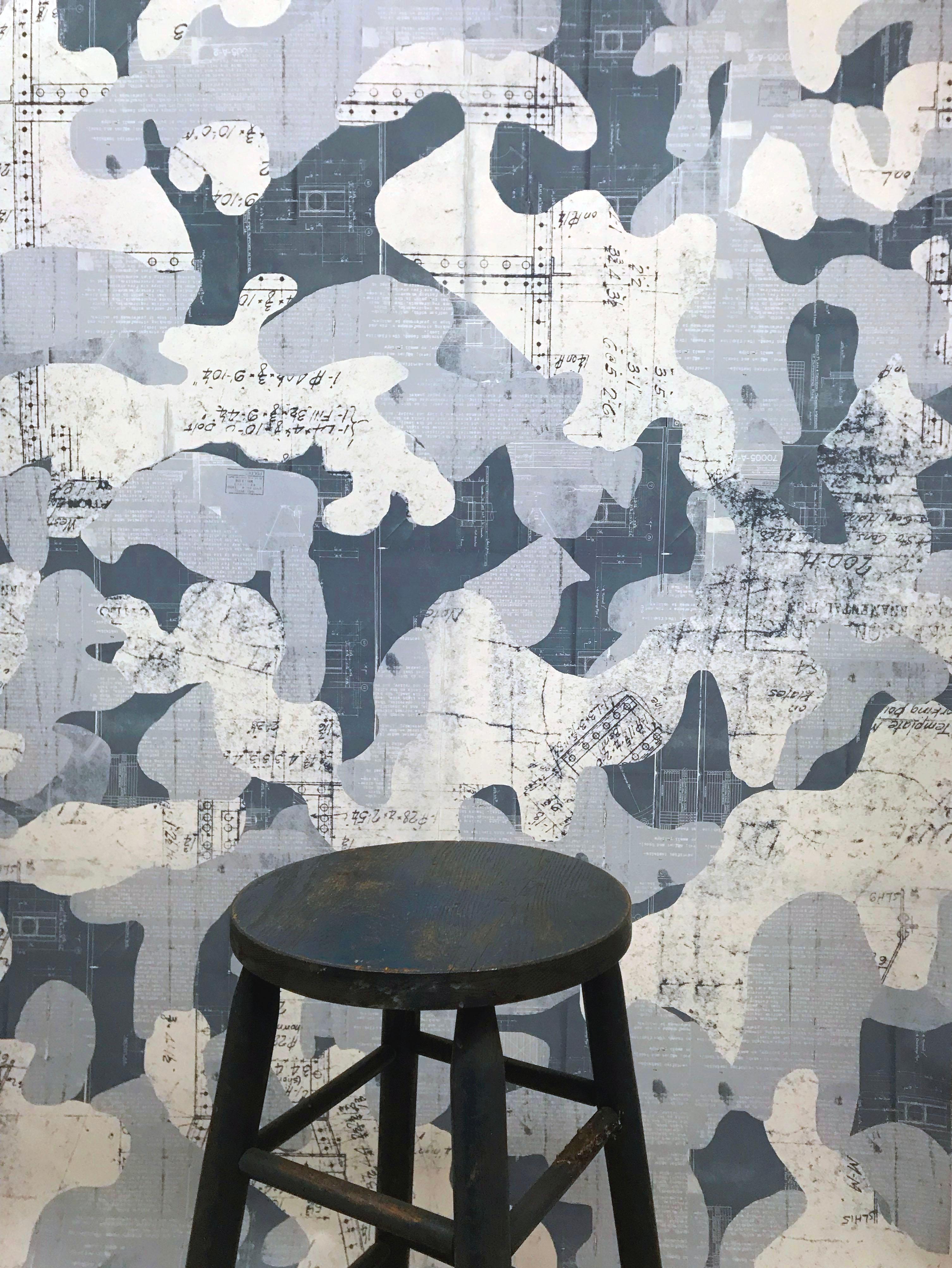 Escape was created using found vintage blue prints from the early to mid-1900s and placed into a fluid, hand drawn camouflage pattern. Intrigued by the idea that blue prints and camo have a utilitarian purpose, we combined them creating an opposite