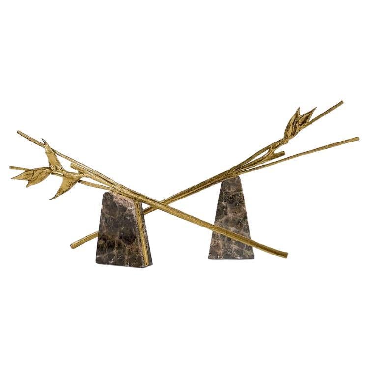 Escape is a sculpture and centerpiece in Emperador marble two piece set