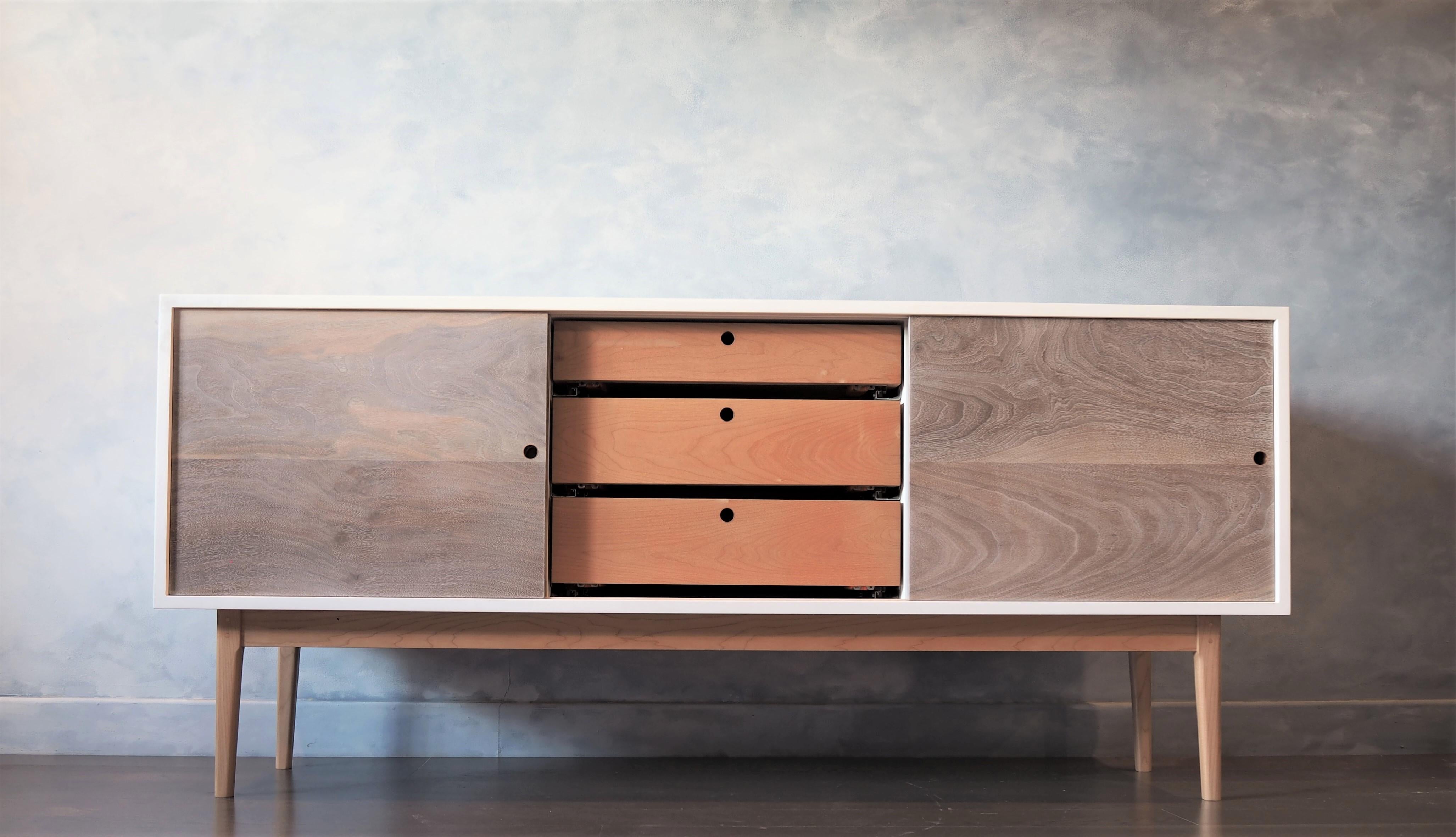 White Sideboard with Sliding walnut Doors and a solid maple base by MSJ Studio 2