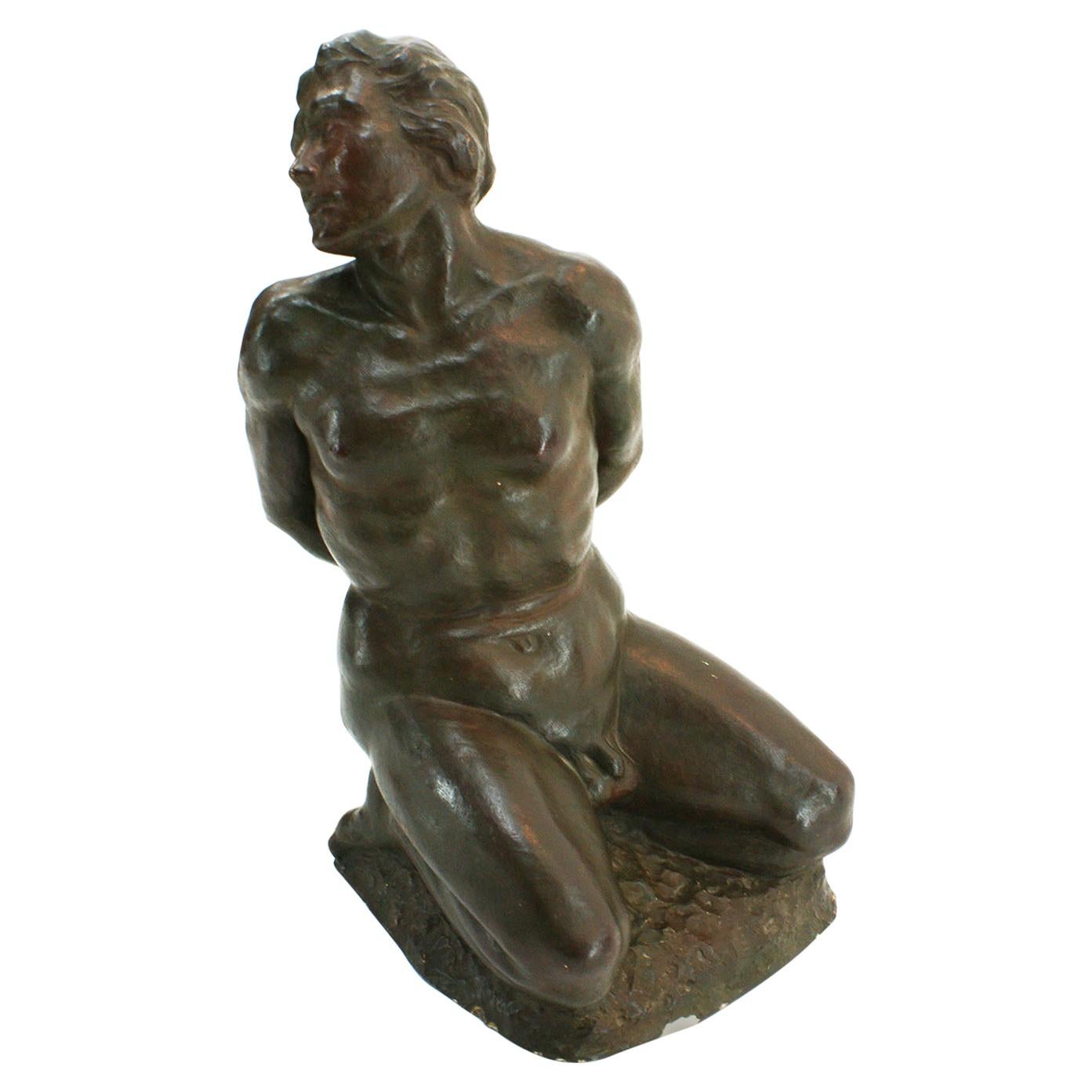 Sculpture d'esclave masculine nue en terre cuite de R.Brageu en vente