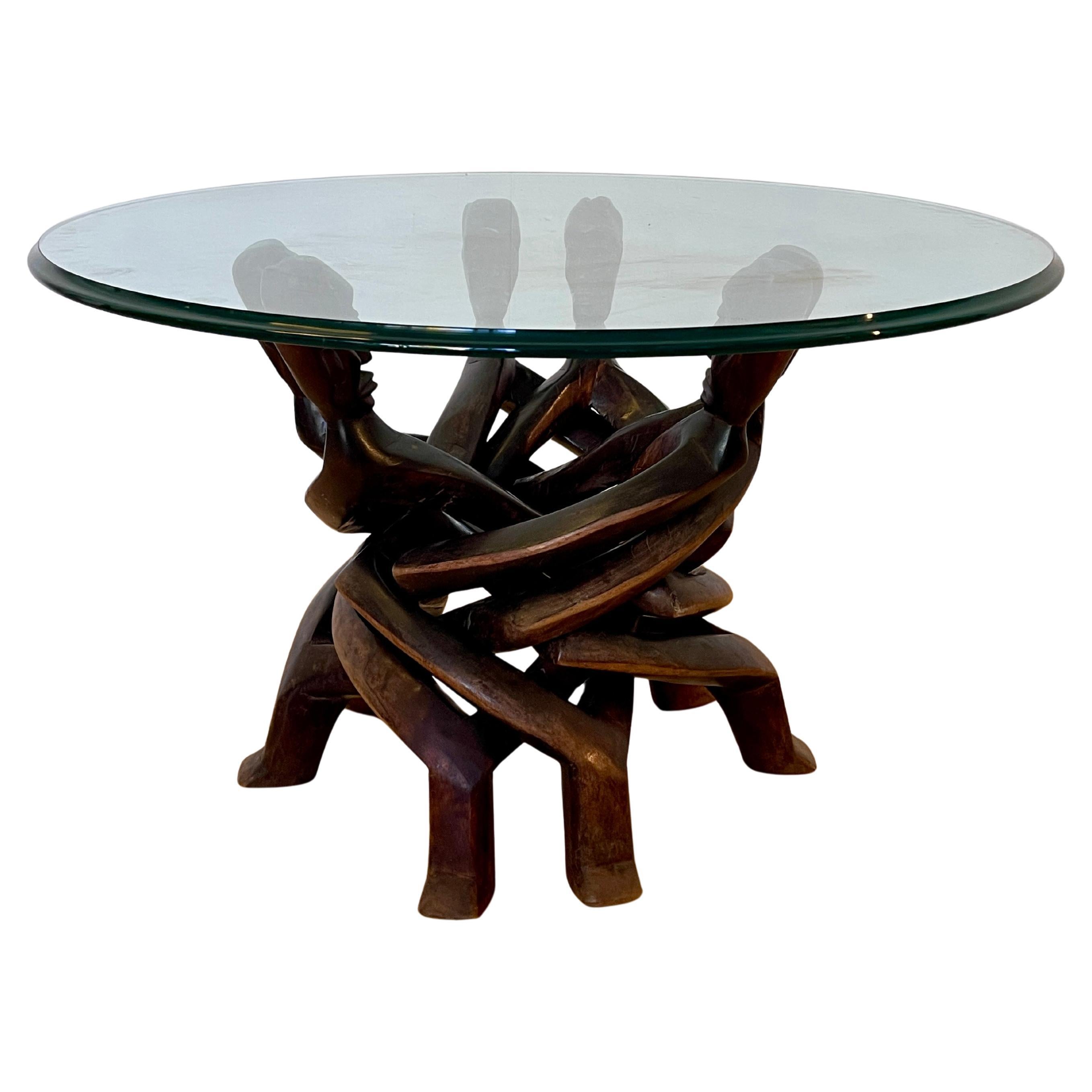 Exclusive African wood coffee table from the 1950s For Sale