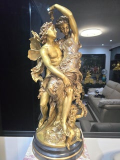 Escultura en bronce patinado de Flora y Céfiro, de Mathurin Moreau, siglo XIX