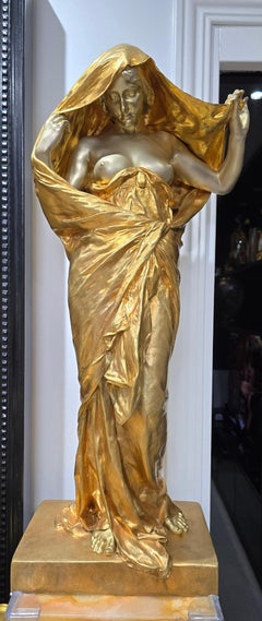 Louis Barrias; "La Nature se dévoilant"; Escultura en bronce dorado, siglo XIX