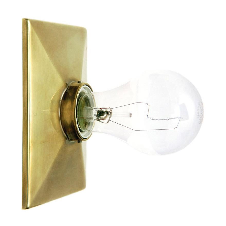 The Escutcheon Surface Mount features a rectangular cast metal plate with a beveled edge design and a porcelain socket. It can be wall or ceiling mounted. 

The maximum wattage bulb recommended is 60W. The Escutcheon is UL listed.

Handcrafted and