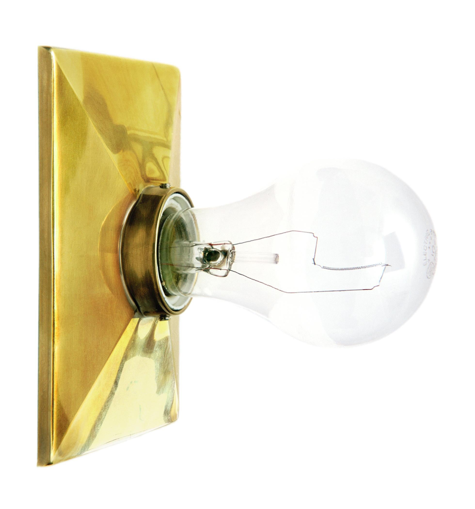 The Escutcheon surface mount features a rectangular cast metal plate with a beveled edge design and a porcelain socket. It can be wall or ceiling mounted. 

The maximum wattage bulb recommended is 60W. The Escutcheon is UL listed.

Handcrafted