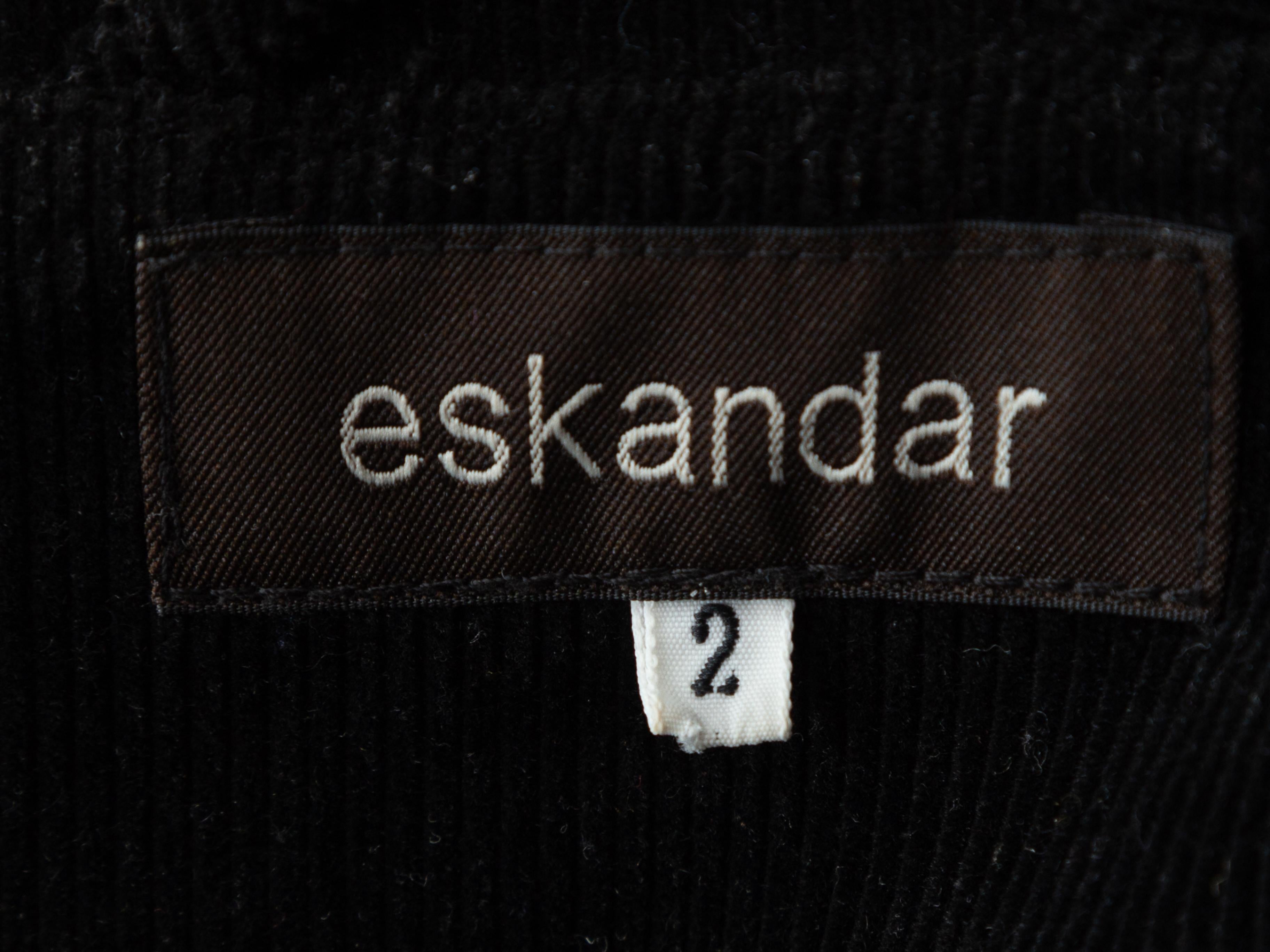 Product details: Black corduroy button-up jacket by Eskandar. Micro pointed collar. Dual patch pockets. Button closures at center front. 51