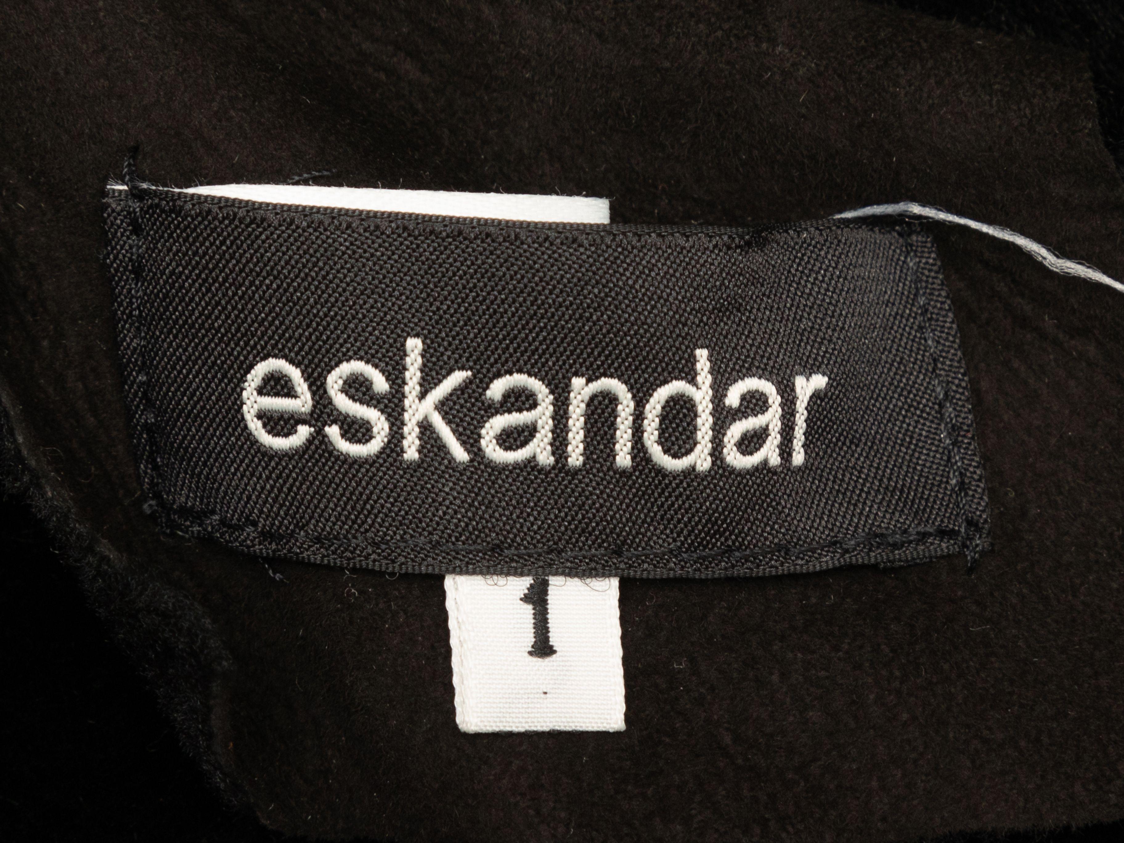 Product Details: Black shearling vest by Eskandar. Open front. Designer size 1. 38