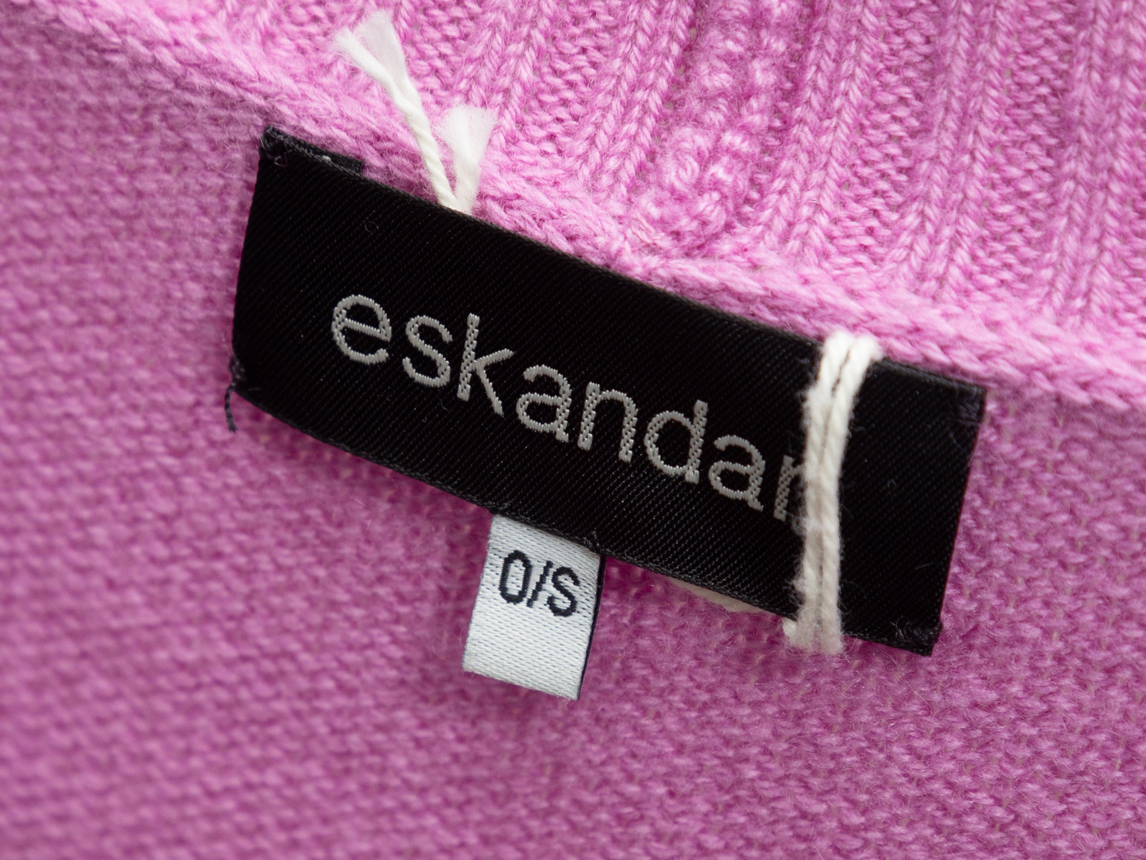Product details: Light fuchsia sweater vest by Eskandar. Plunging V-neckline. 29