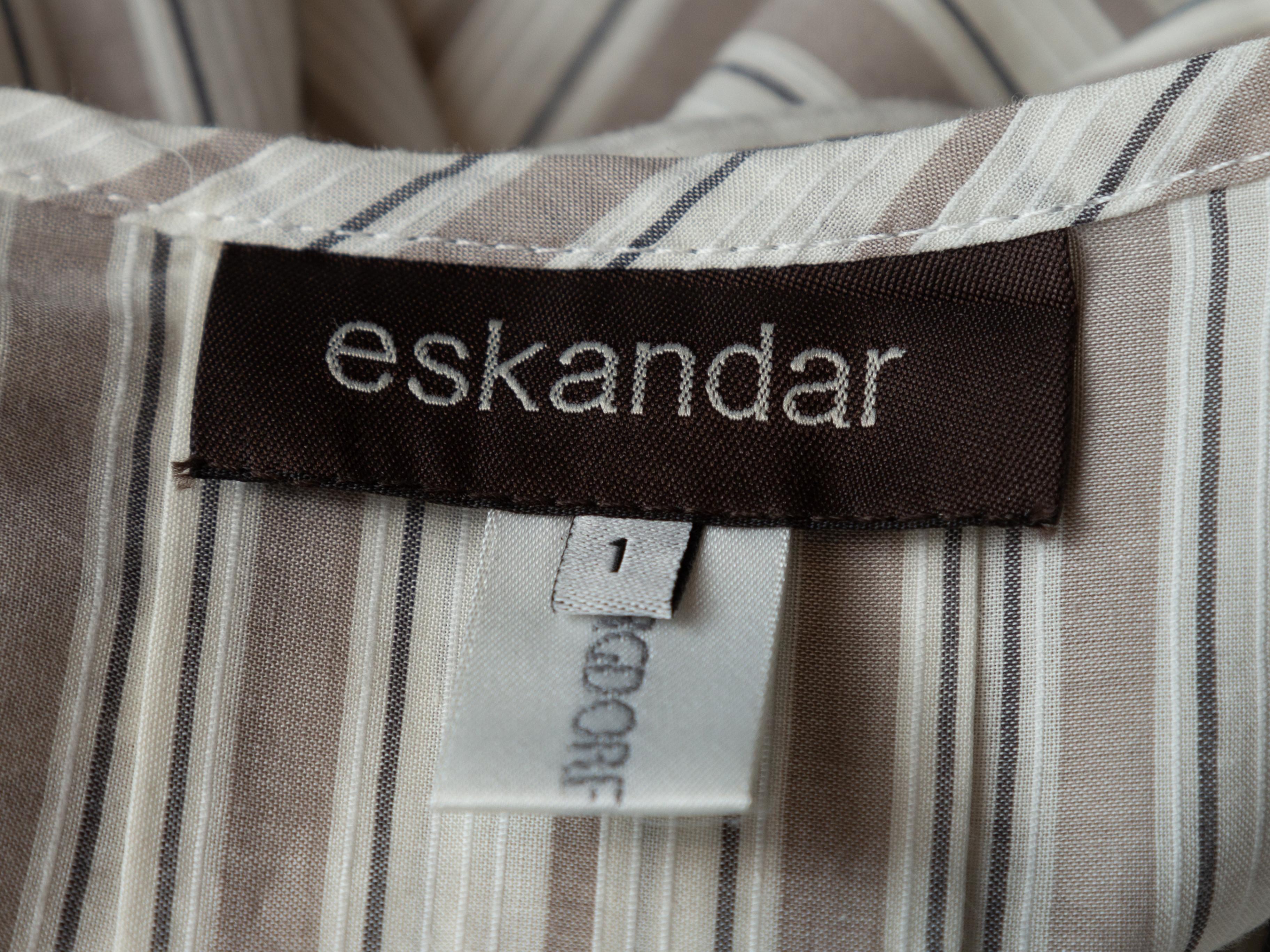 Product details: White and grey long sleeve button-up top by Eskandar. Striped pattern throughout. Crew neck. Button closures at center front. 44