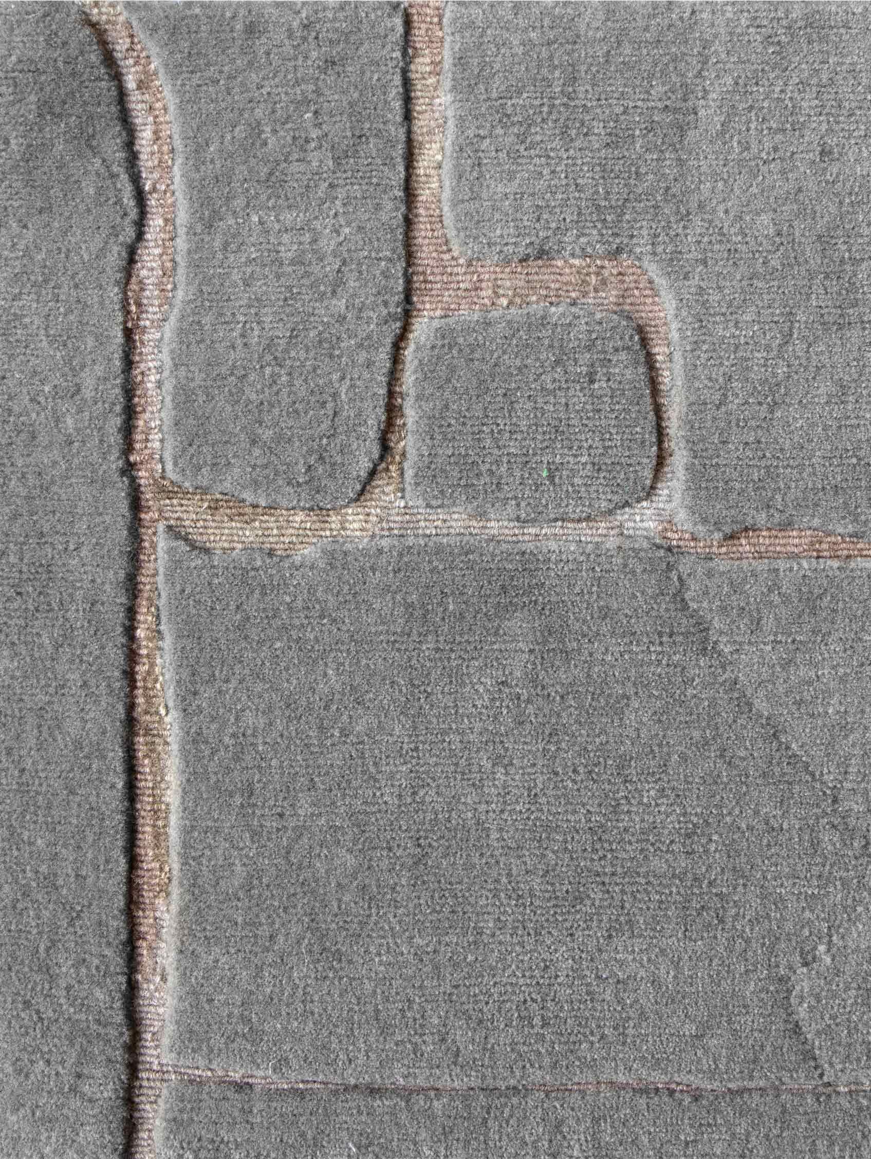 Muster des Teppichs: Portico - Graustufen
MATERIAL: Neuseeländische Wolle
Qualität: Tibetisches Kreuzgeflecht 
Größe: 8' x 10'
Hergestellt in Nepal
Entworfen von Eskayel.