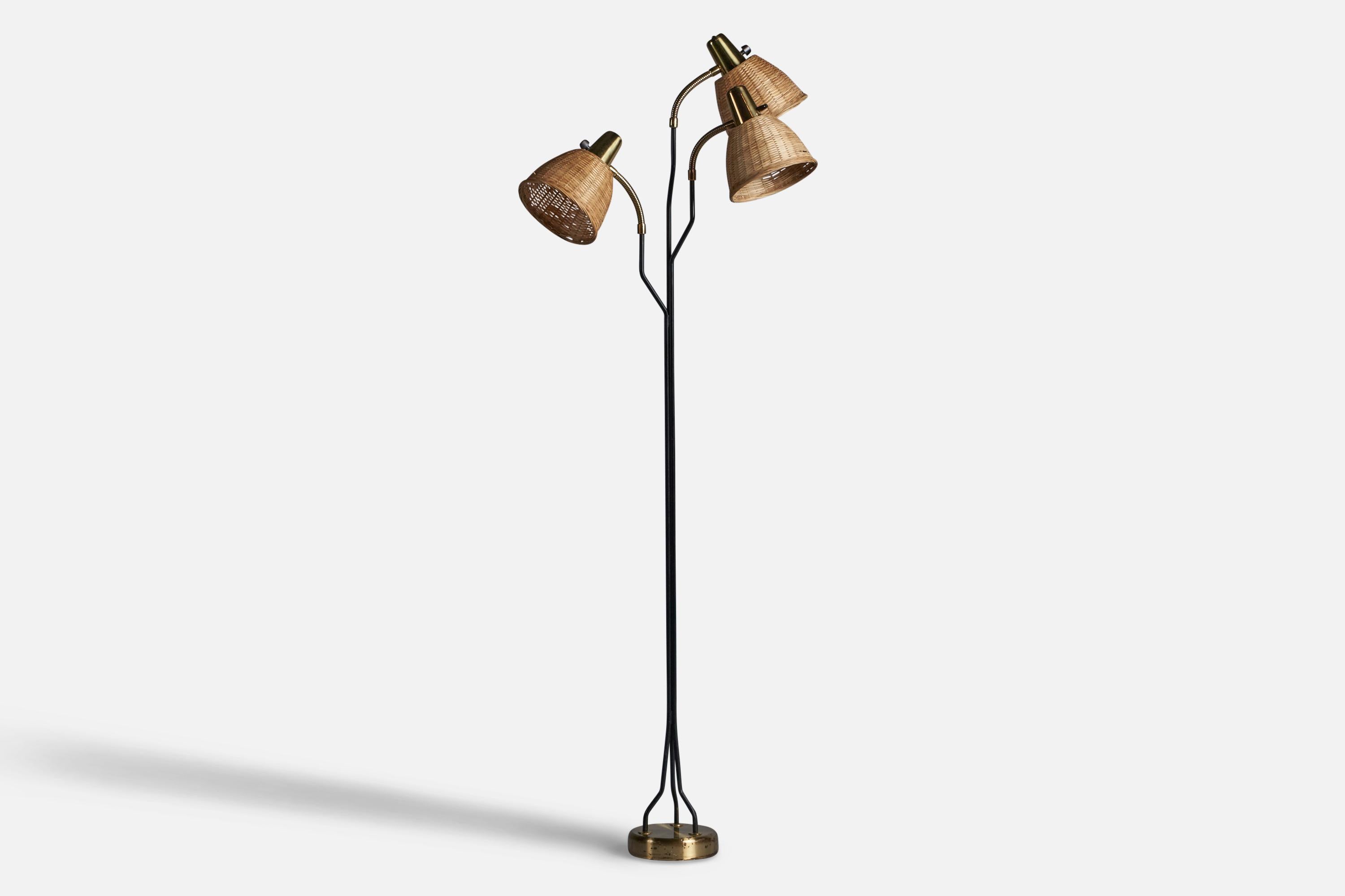An adjustable three-armed brass, black-lacquered metal and rattan floor lamp, designed and produced by Eskilstuna Elektrofabrik Aktiebolag, Sweden, c. 1960s.

Overall Dimensions (inches): 63” H x 17” W x 14” D
Bulb Specifications: E-26 Bulb
Number